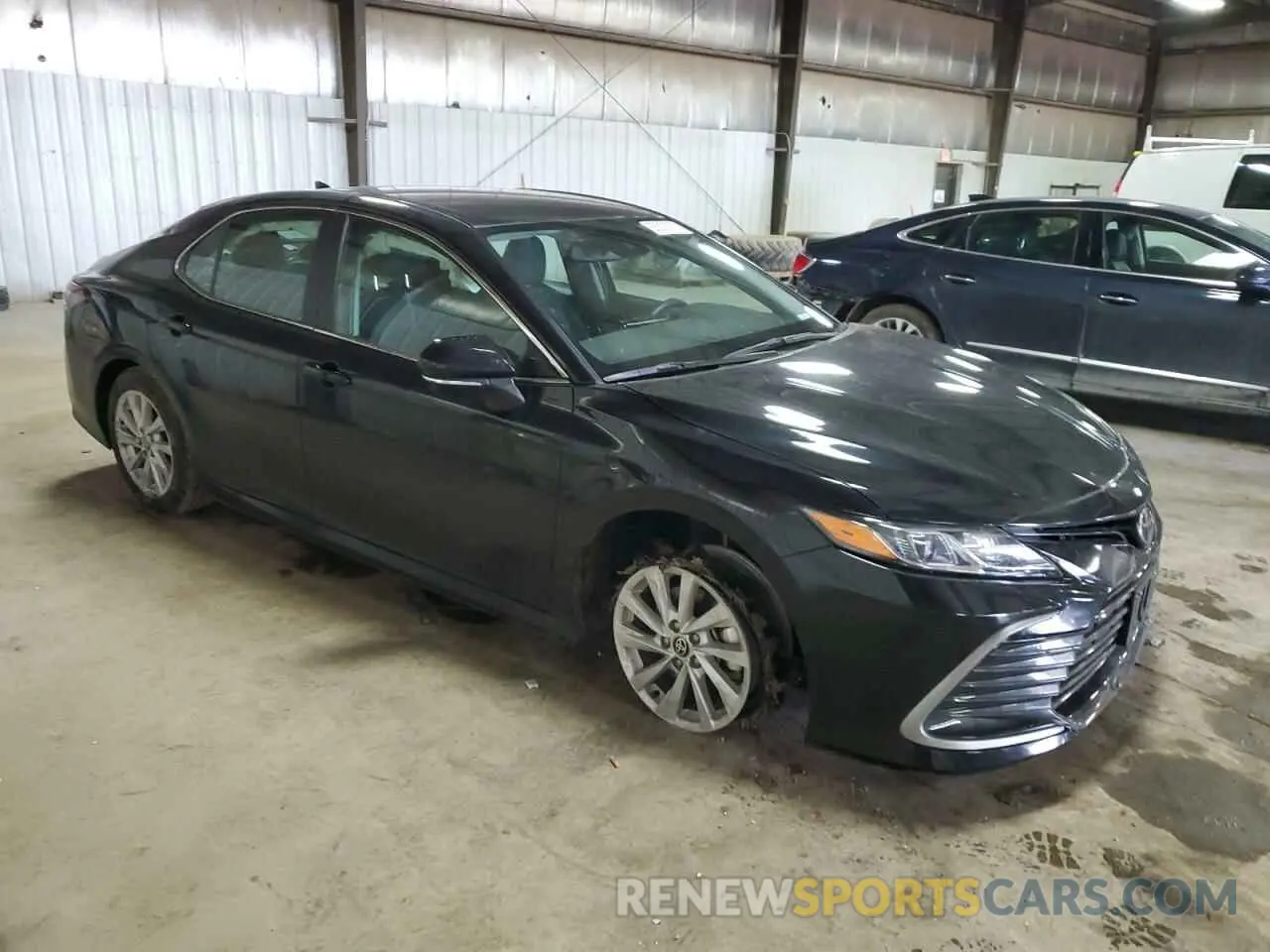 4 Photograph of a damaged car 4T1R11AK0RU899633 TOYOTA CAMRY 2024