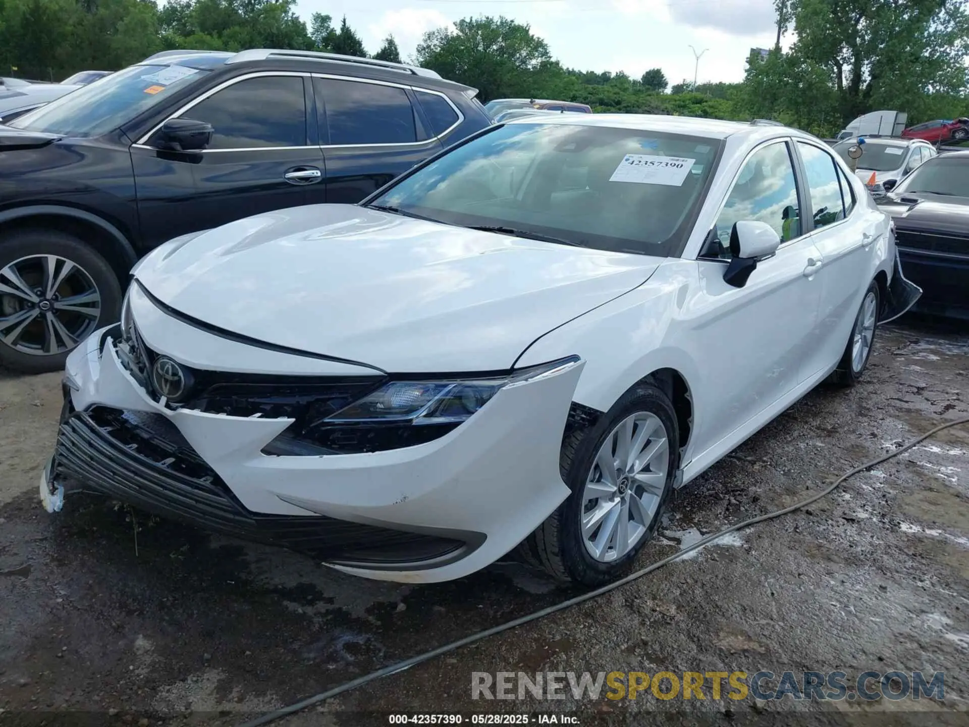2 Photograph of a damaged car 4T1R11AK1RU909862 TOYOTA CAMRY 2024