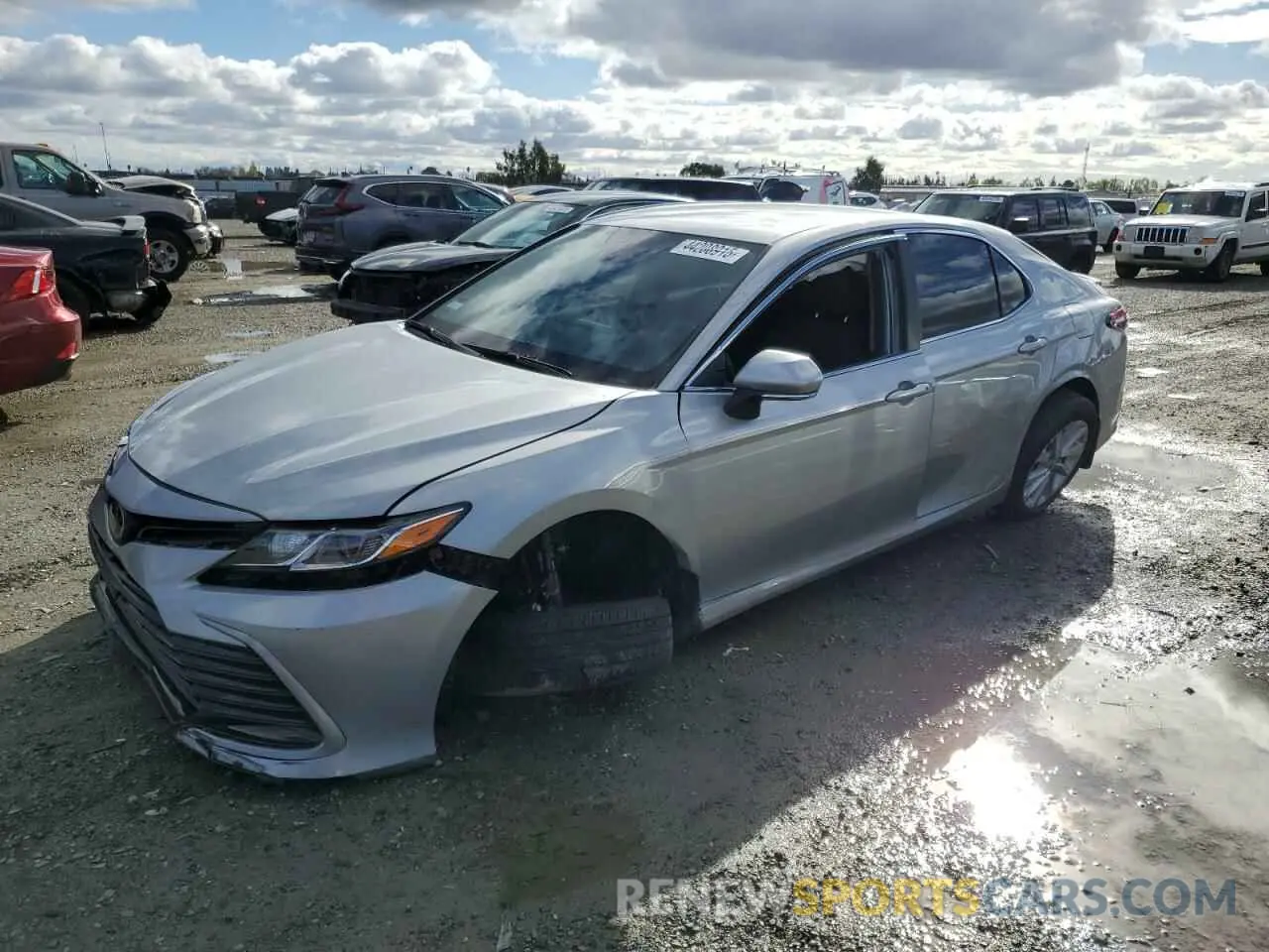 1 Photograph of a damaged car 4T1R11AK3RU265815 TOYOTA CAMRY 2024