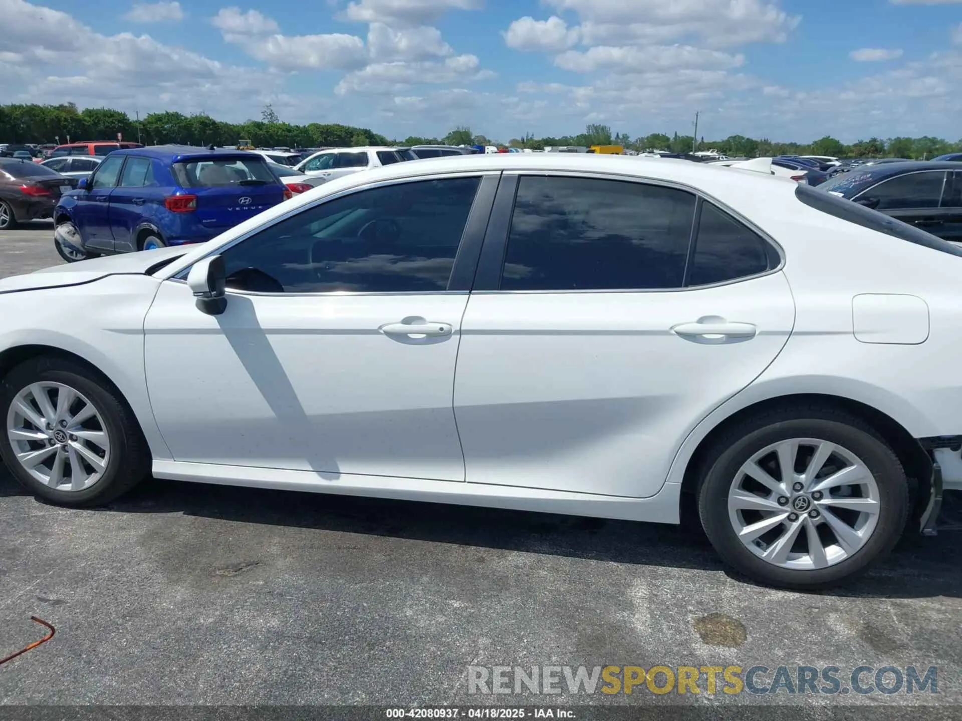 14 Photograph of a damaged car 4T1R11AK5RU881936 TOYOTA CAMRY 2024
