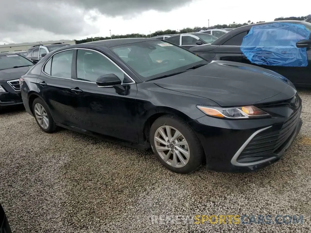 4 Photograph of a damaged car 4T1R11AK6RU243288 TOYOTA CAMRY 2024