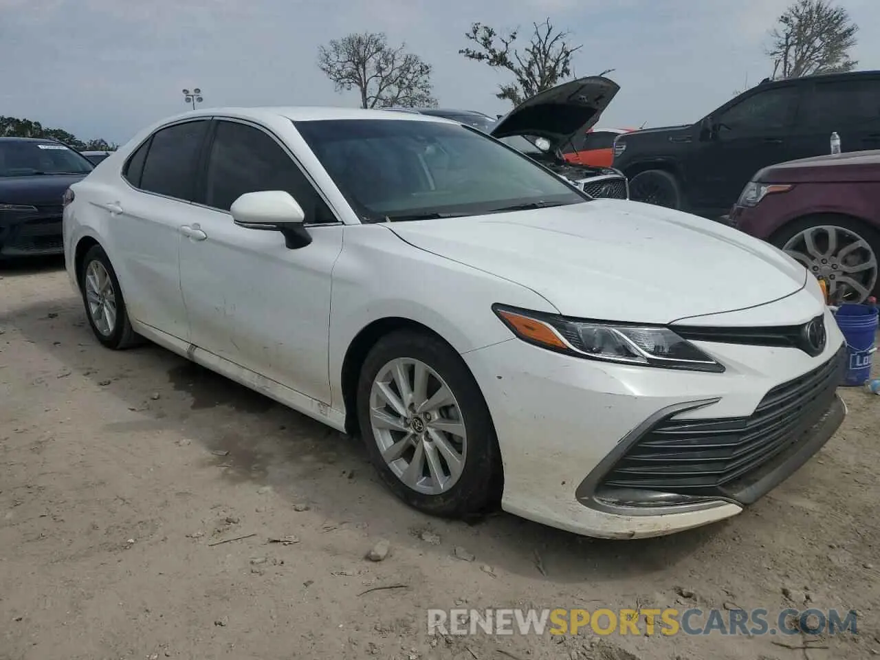 4 Photograph of a damaged car 4T1R11AK8RU873801 TOYOTA CAMRY 2024