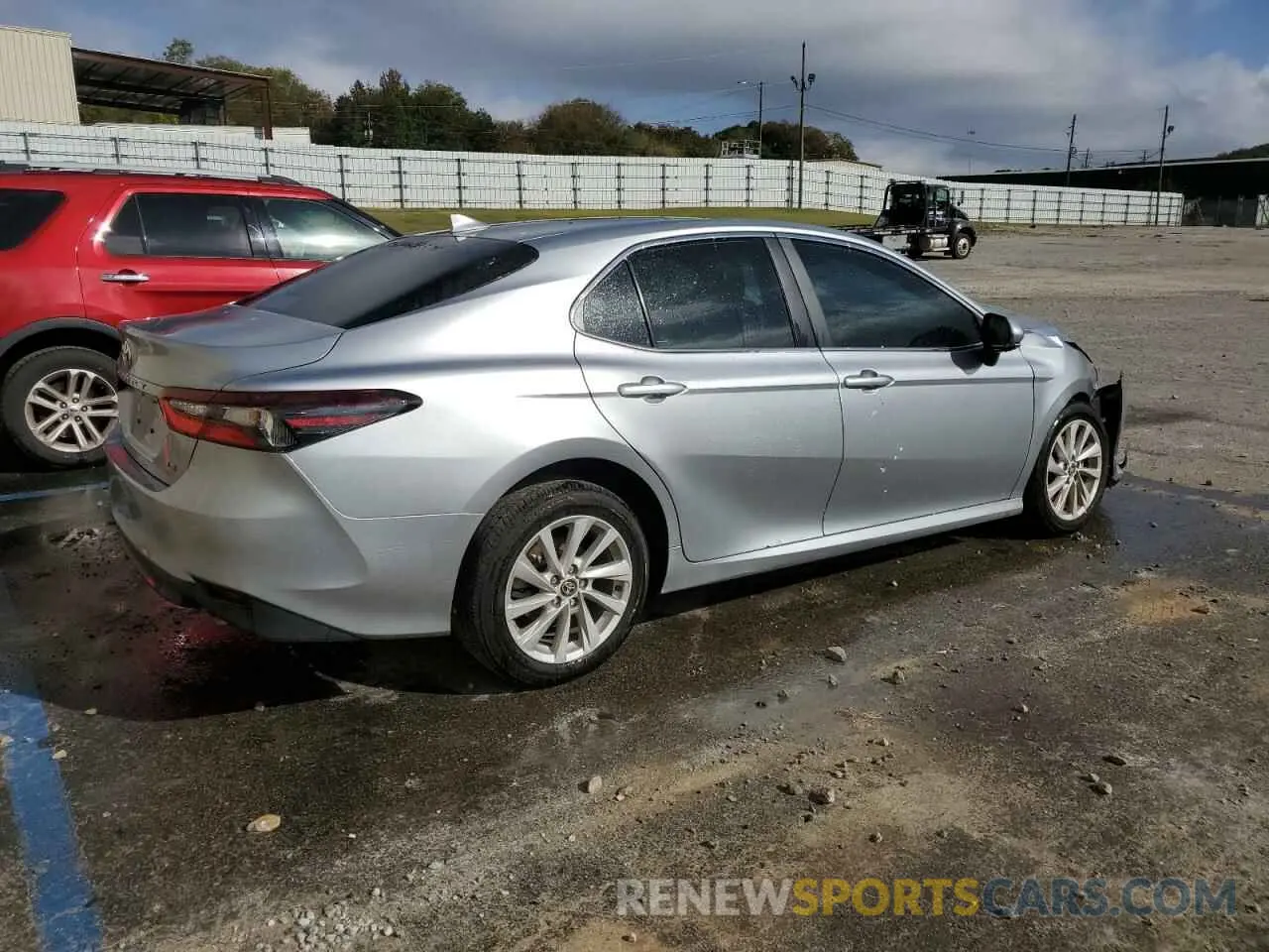 3 Photograph of a damaged car 4T1R11AK8RU905498 TOYOTA CAMRY 2024