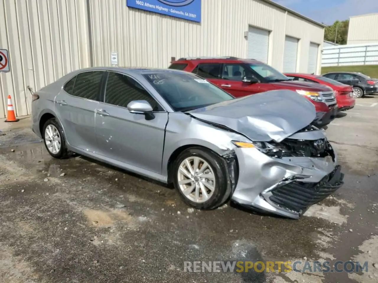 4 Photograph of a damaged car 4T1R11AK8RU905498 TOYOTA CAMRY 2024