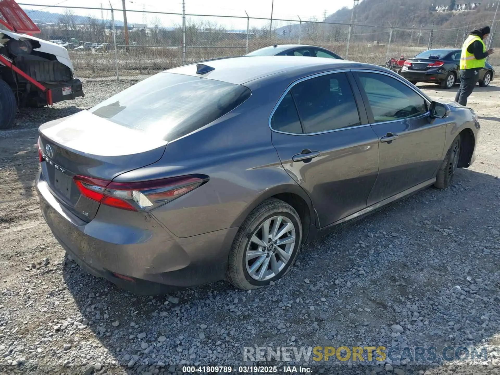 4 Photograph of a damaged car 4T1R11AK9RU864461 TOYOTA CAMRY 2024