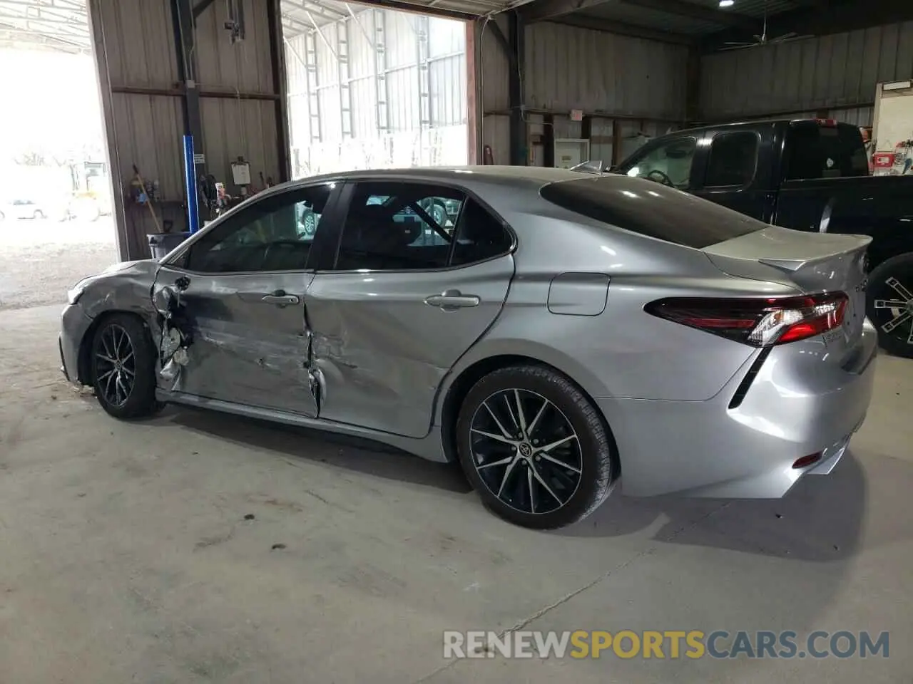 2 Photograph of a damaged car 4T1T11AK0RU857923 TOYOTA CAMRY 2024
