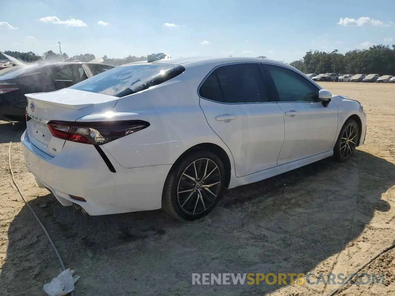 3 Photograph of a damaged car 4T1T11AK0RU894602 TOYOTA CAMRY 2024