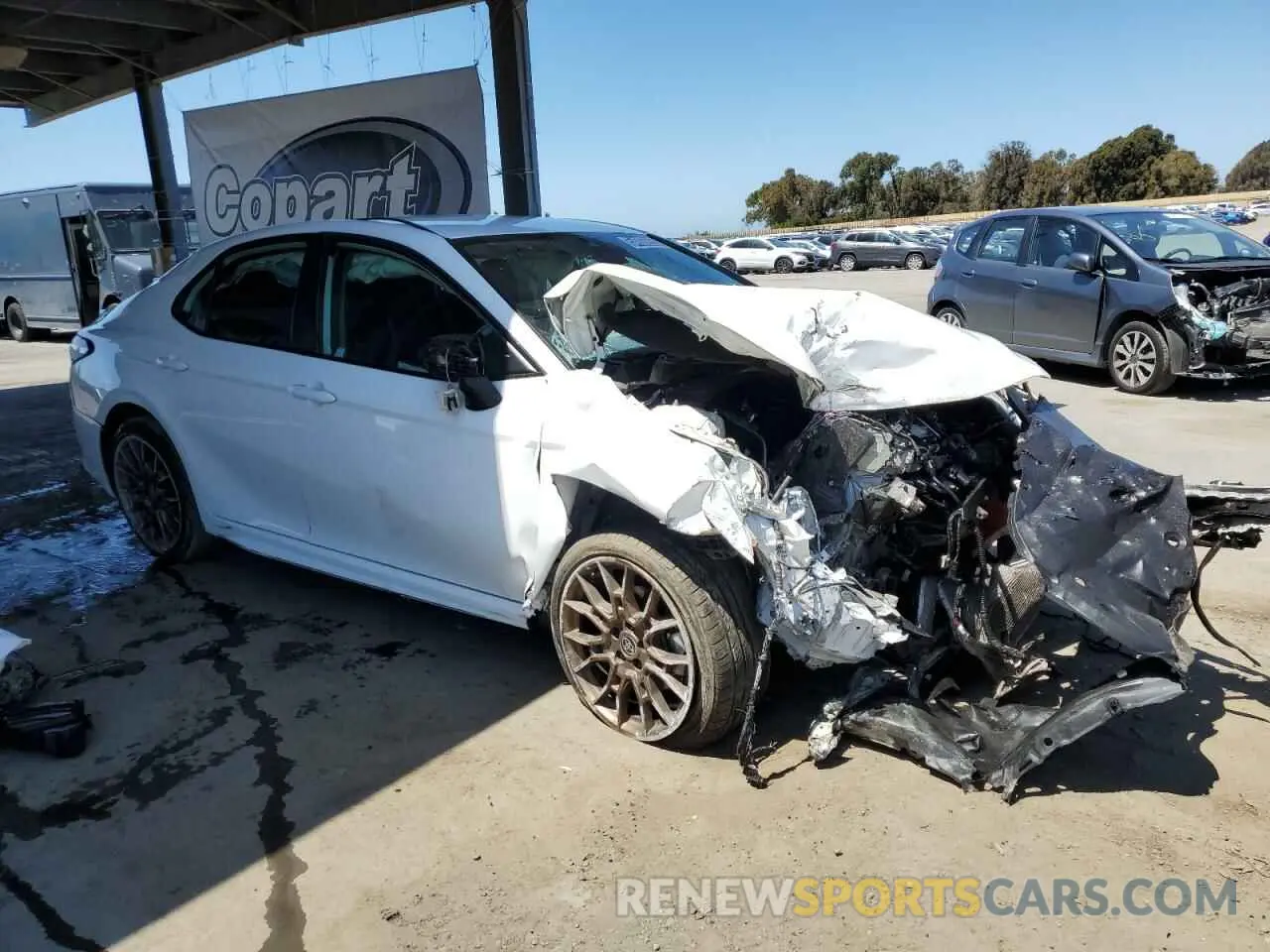 4 Photograph of a damaged car 4T1T11AK1RU195480 TOYOTA CAMRY 2024