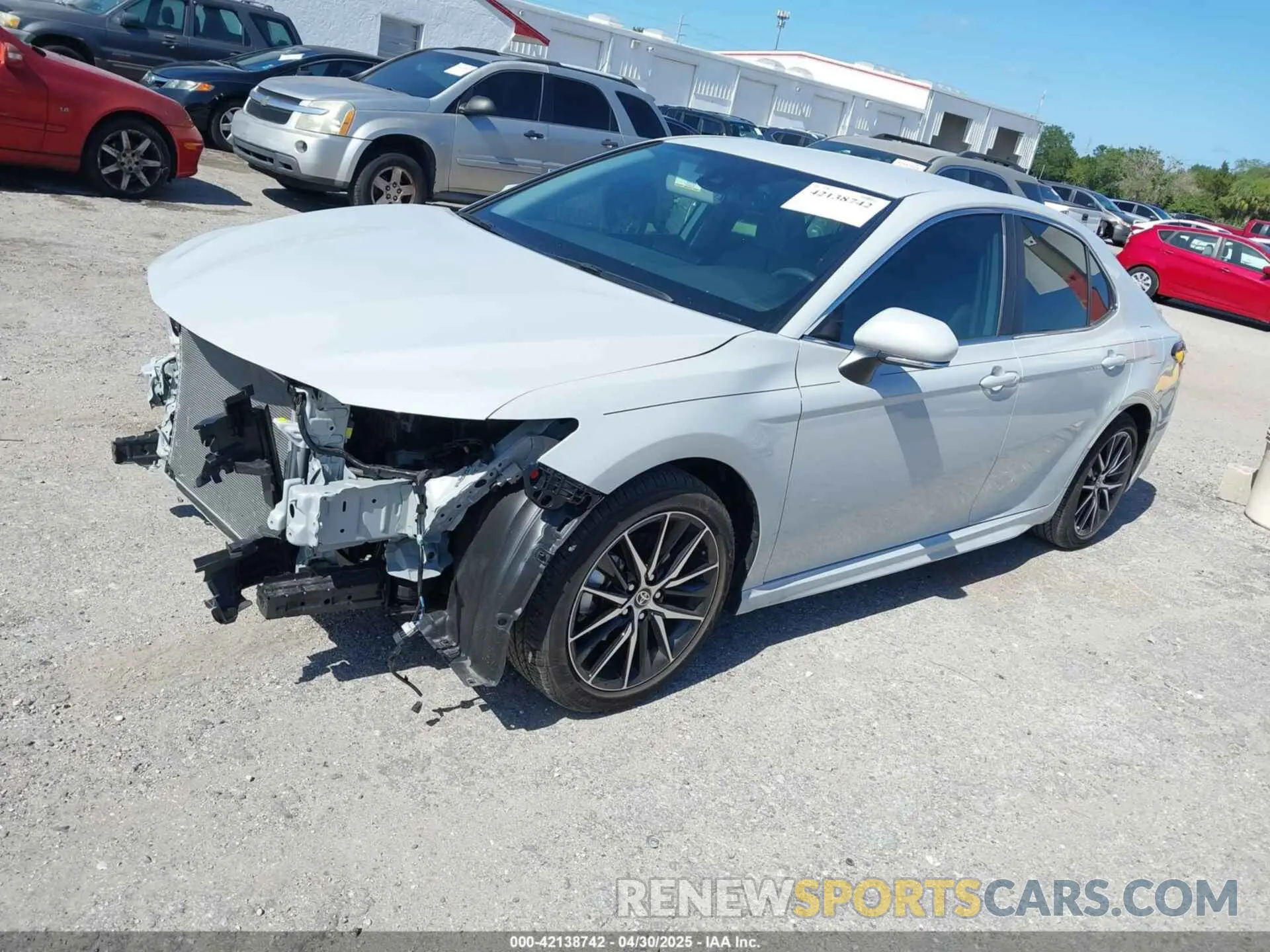 2 Photograph of a damaged car 4T1T11AK1RU242572 TOYOTA CAMRY 2024