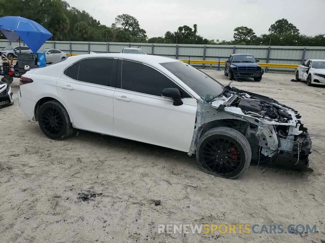 4 Photograph of a damaged car 4T1T11AK1RU843612 TOYOTA CAMRY 2024