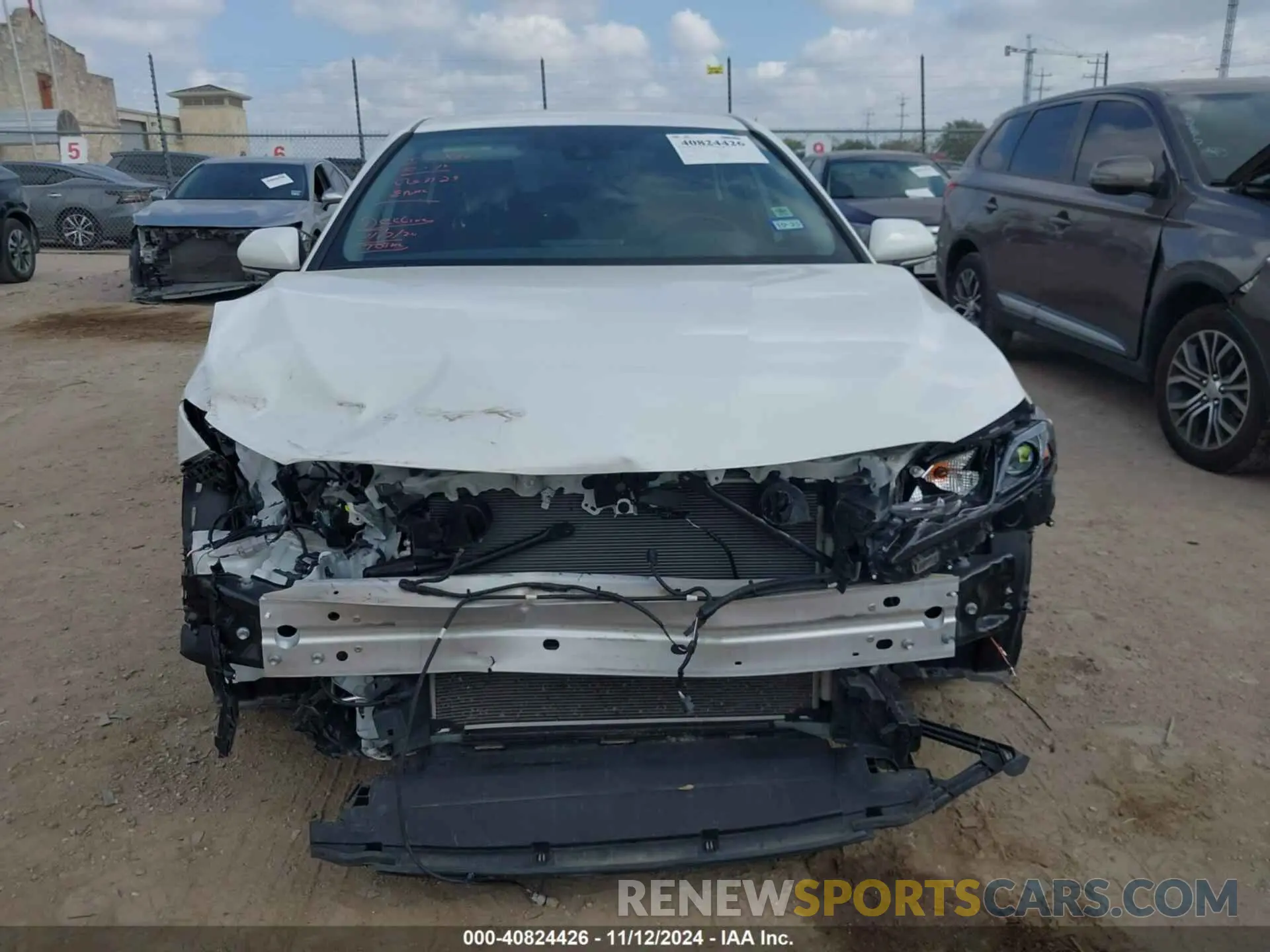 13 Photograph of a damaged car 4T1T11AK1RU860667 TOYOTA CAMRY 2024