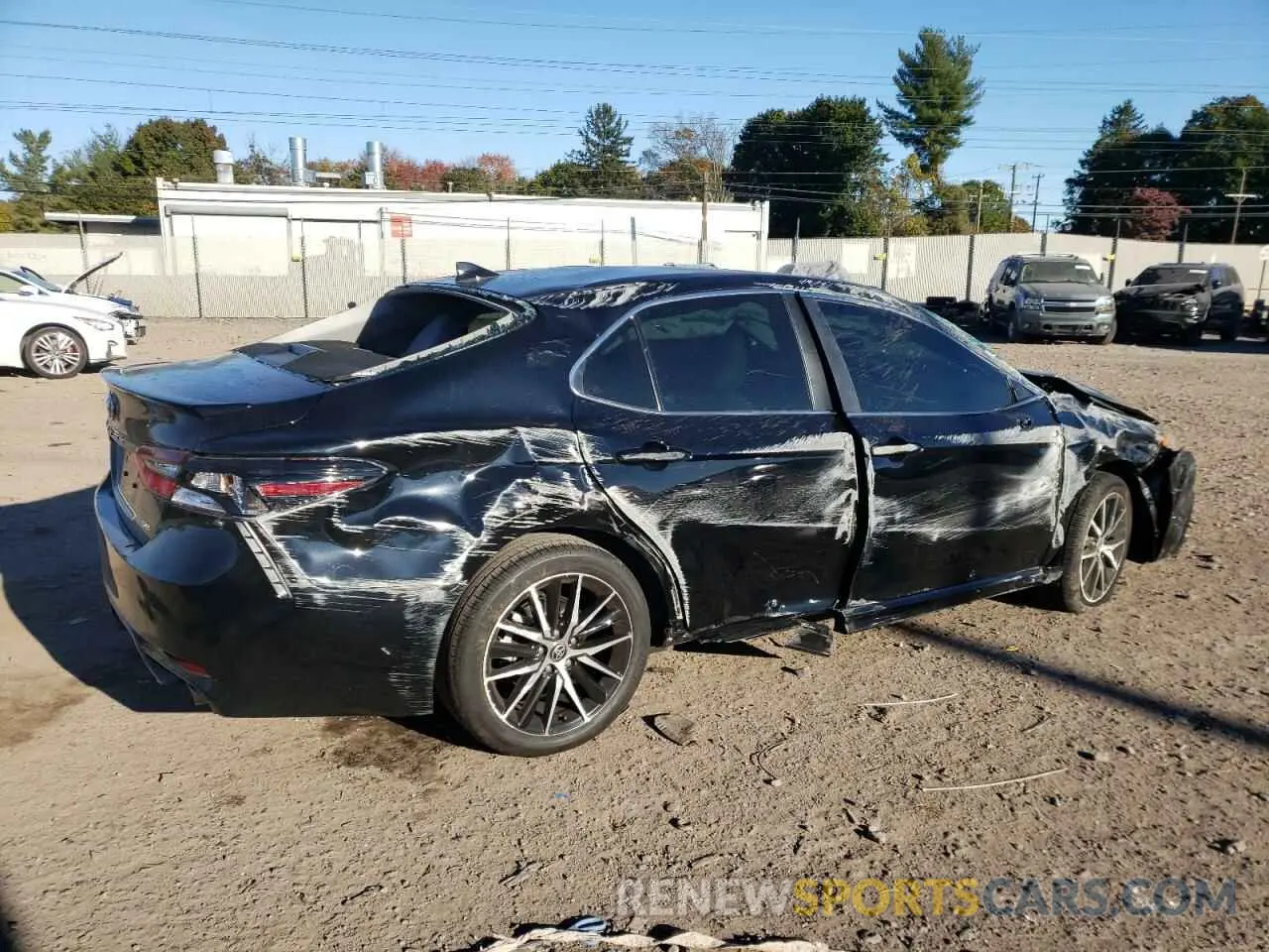3 Photograph of a damaged car 4T1T11AK2RU879941 TOYOTA CAMRY 2024