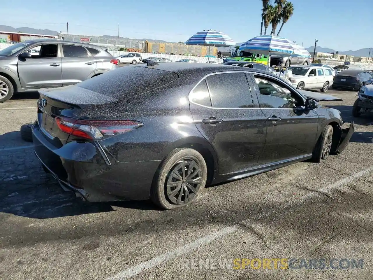 3 Photograph of a damaged car 4T1T11AK3RU855809 TOYOTA CAMRY 2024