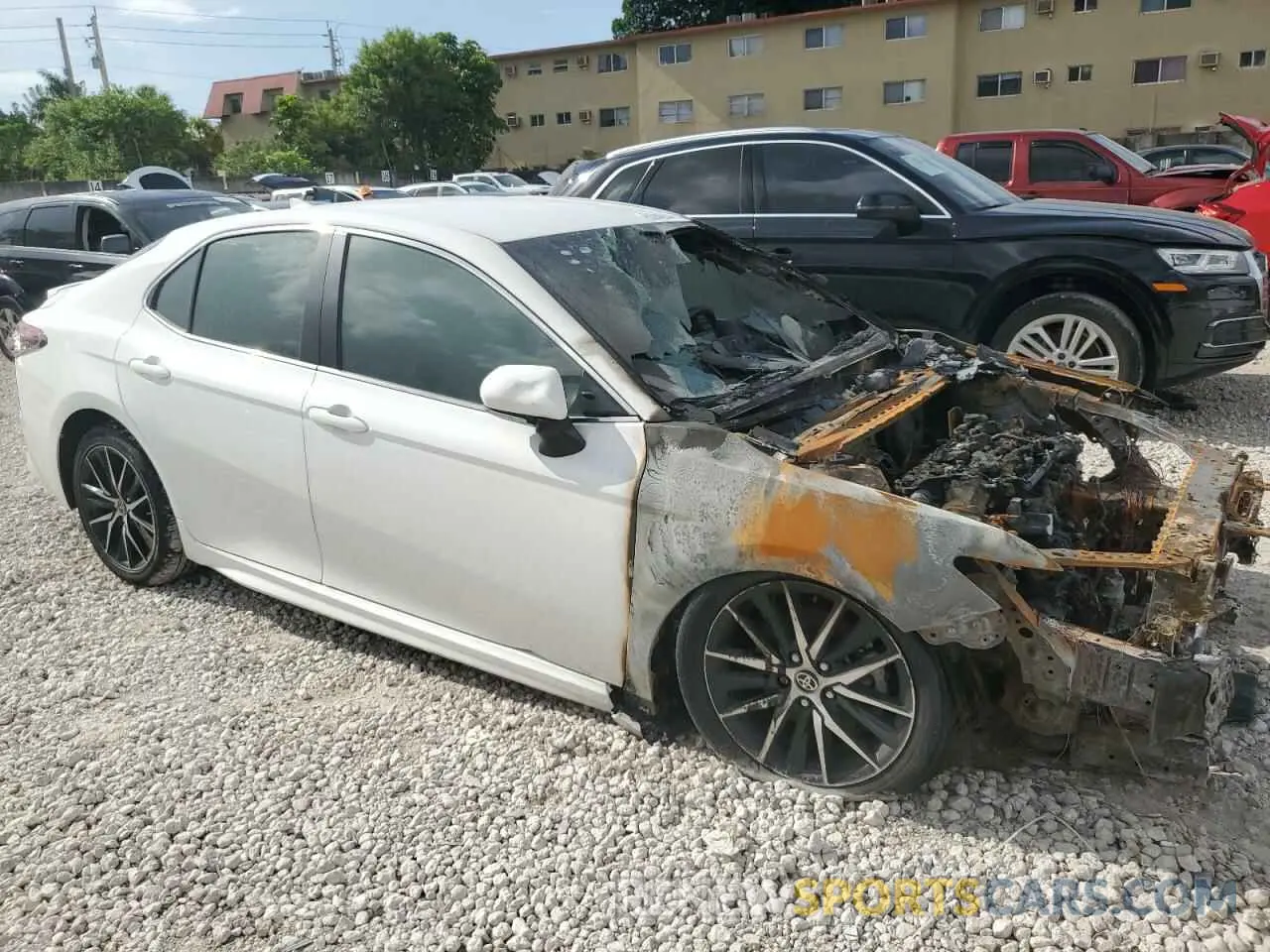 4 Photograph of a damaged car 4T1T11AK4RU849999 TOYOTA CAMRY 2024