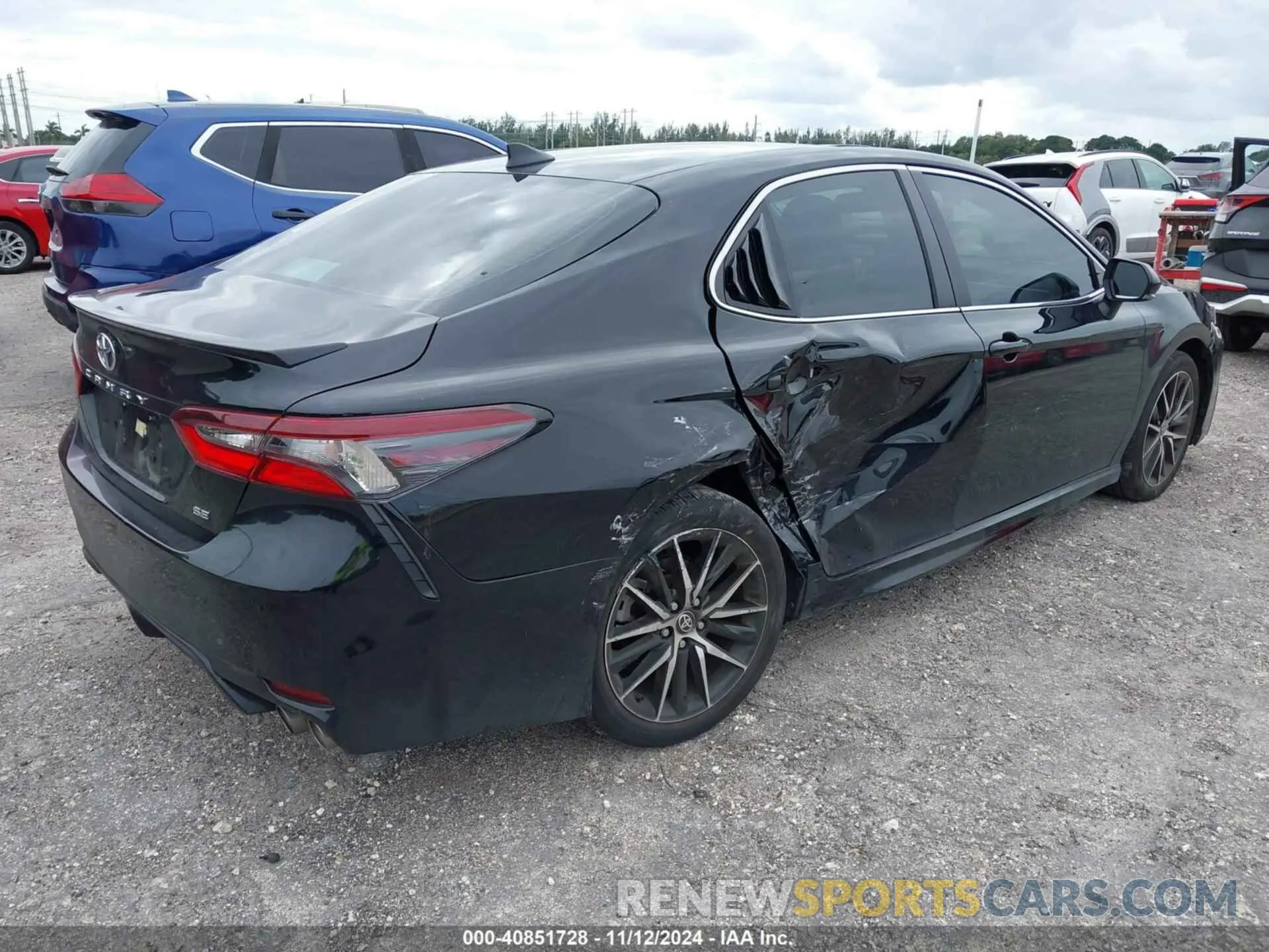 4 Photograph of a damaged car 4T1T11AK6RU901343 TOYOTA CAMRY 2024