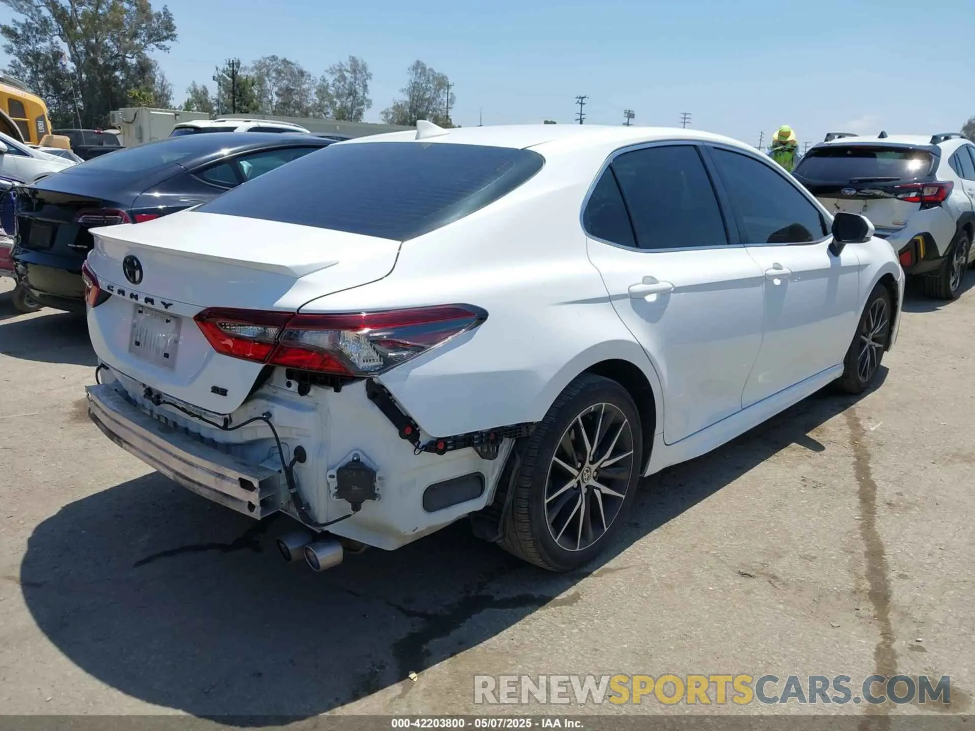 4 Photograph of a damaged car 4T1T11AK8RU879460 TOYOTA CAMRY 2024