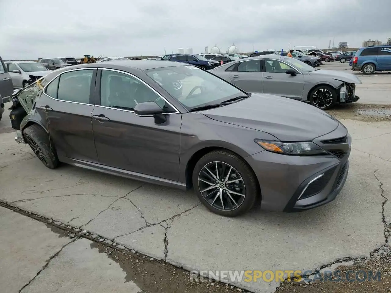 4 Photograph of a damaged car 4T1T11AKXRU853667 TOYOTA CAMRY 2024