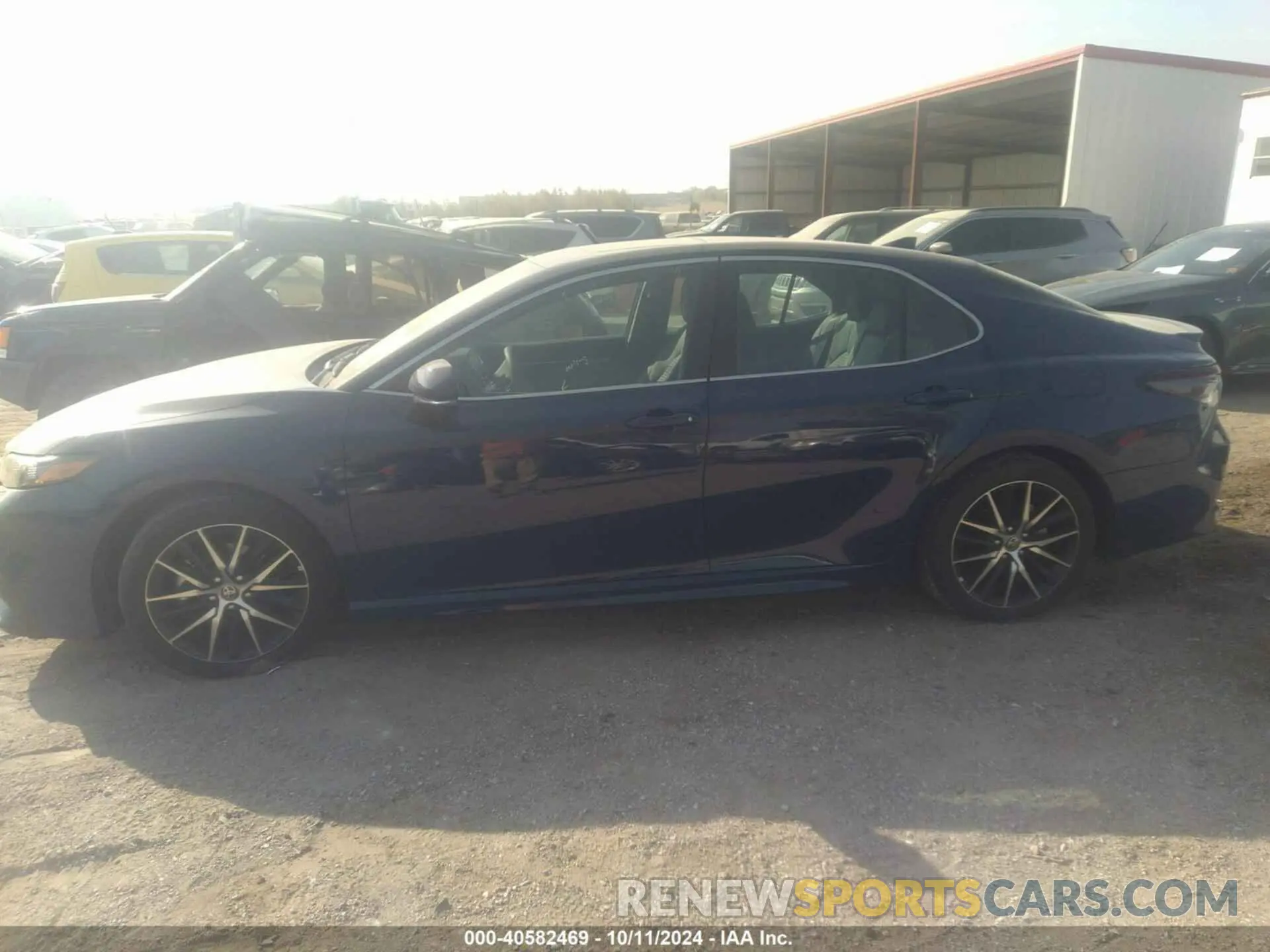 14 Photograph of a damaged car 4T1T11BK4RU129794 TOYOTA CAMRY 2024