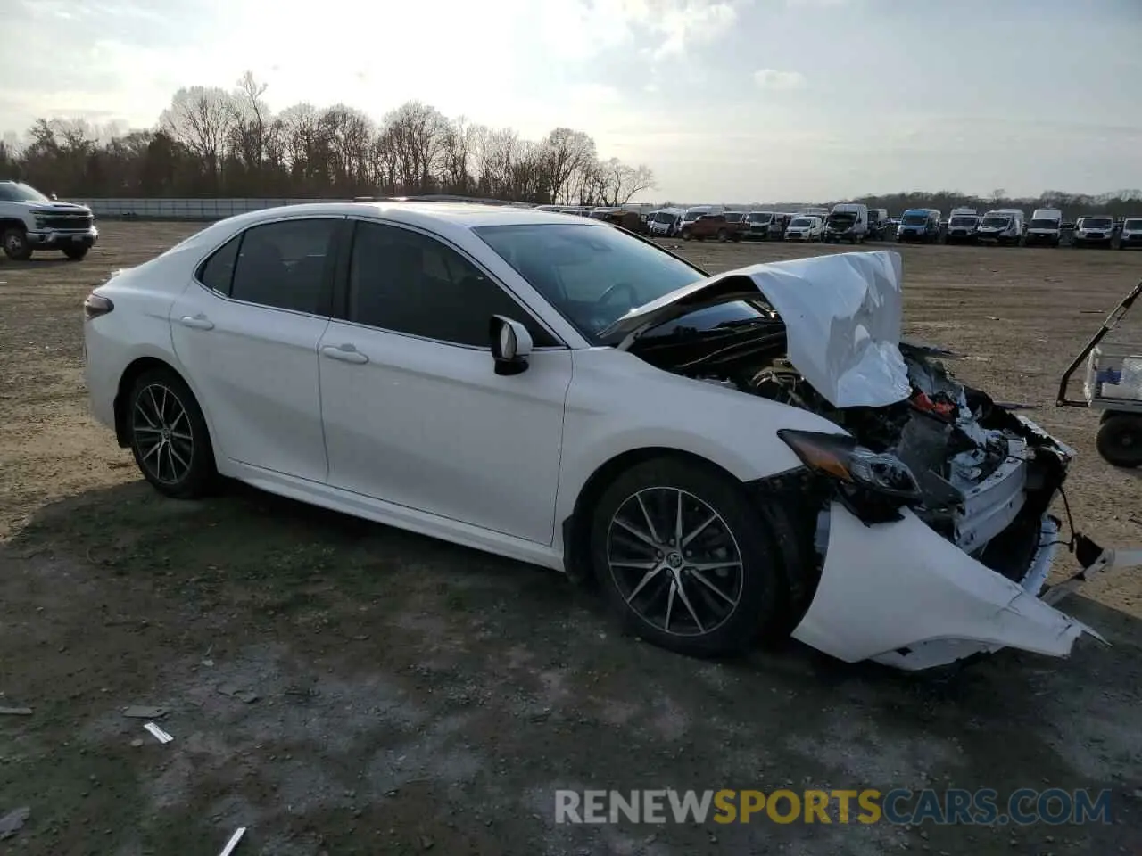 4 Photograph of a damaged car 4T1T11BK5RU121073 TOYOTA CAMRY 2024