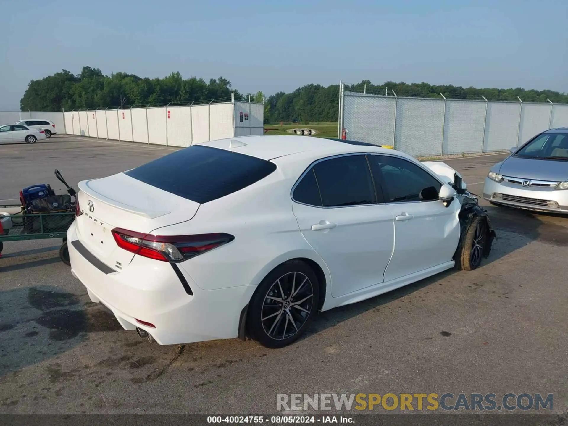 4 Photograph of a damaged car 4T1T11BK8RU109855 TOYOTA CAMRY 2024