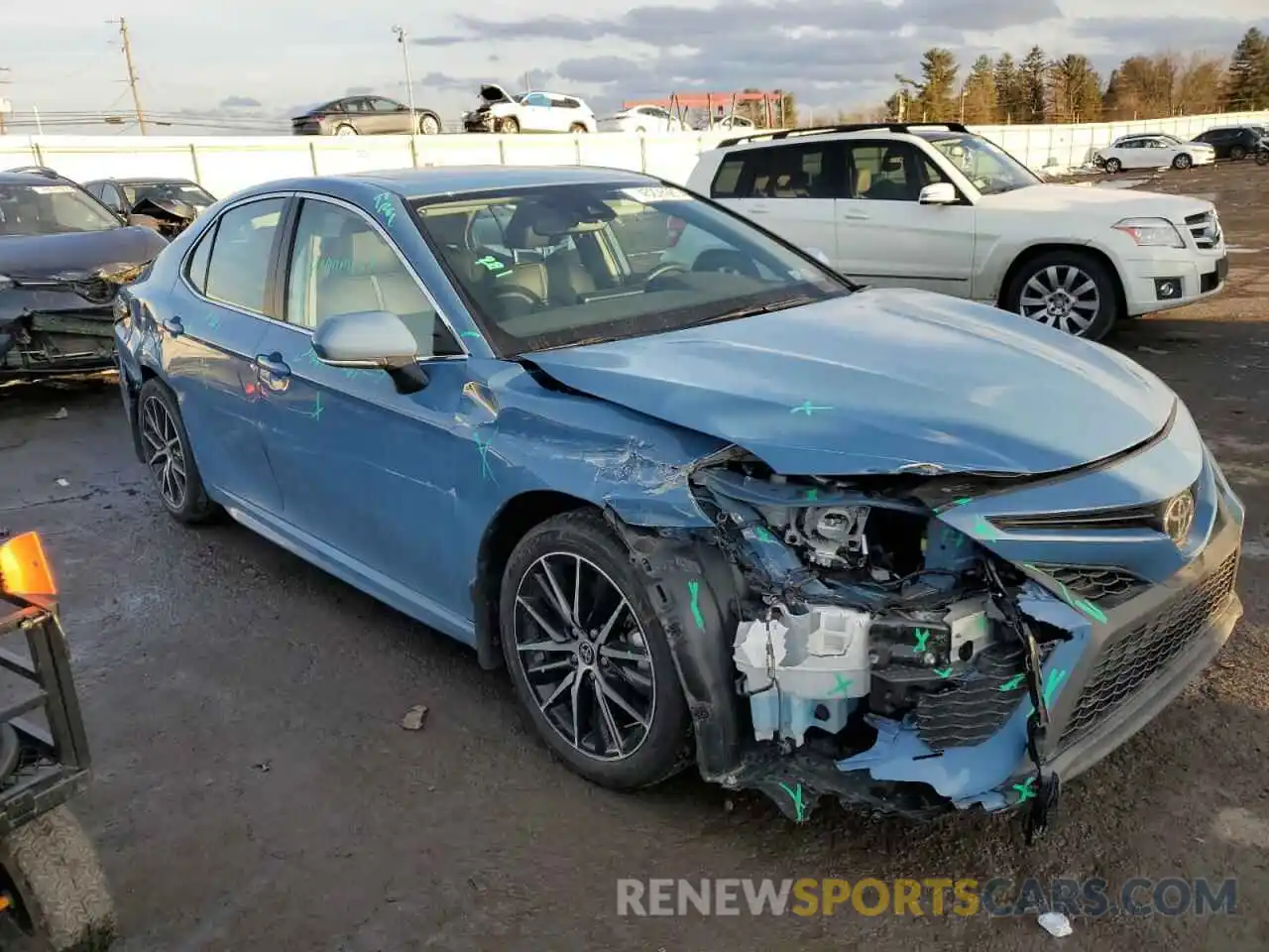 4 Photograph of a damaged car 4T1T11BK9RU117043 TOYOTA CAMRY 2024