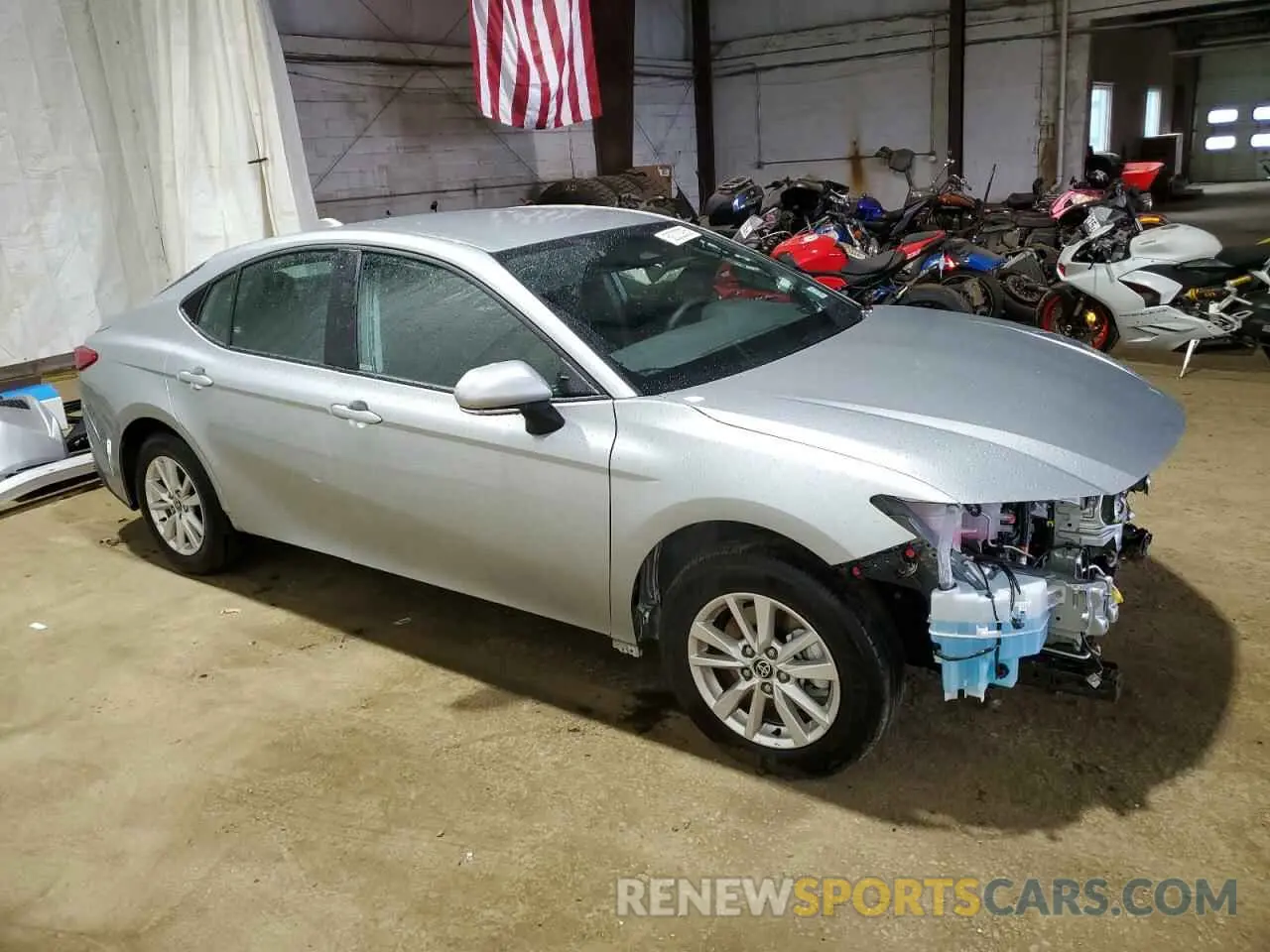 4 Photograph of a damaged car 4T1DBADK4SU011300 TOYOTA CAMRY 2025