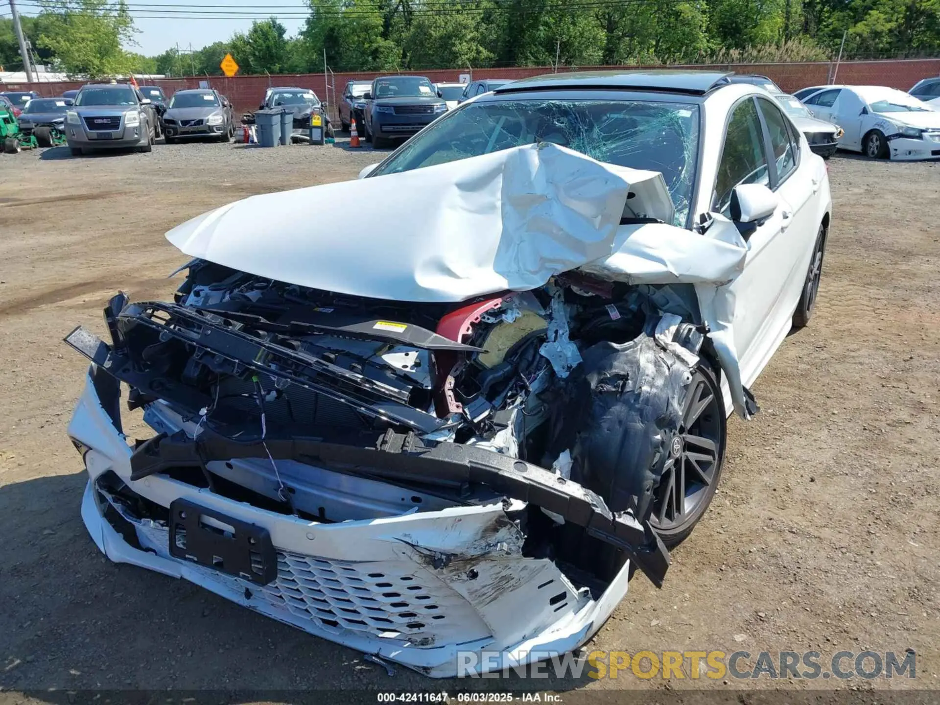18 Photograph of a damaged car 4T1DBADK4SU509867 TOYOTA CAMRY 2025