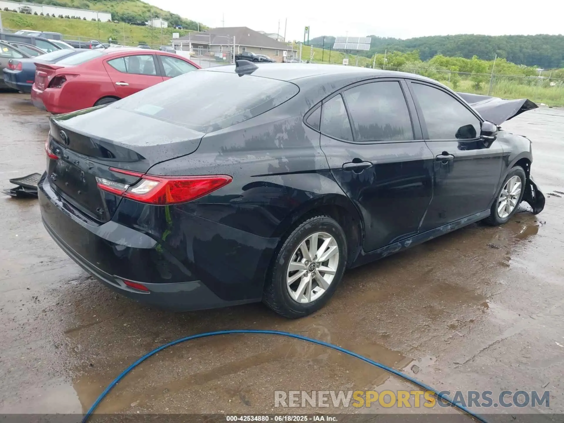 4 Photograph of a damaged car 4T1DBADK5SU503558 TOYOTA CAMRY 2025