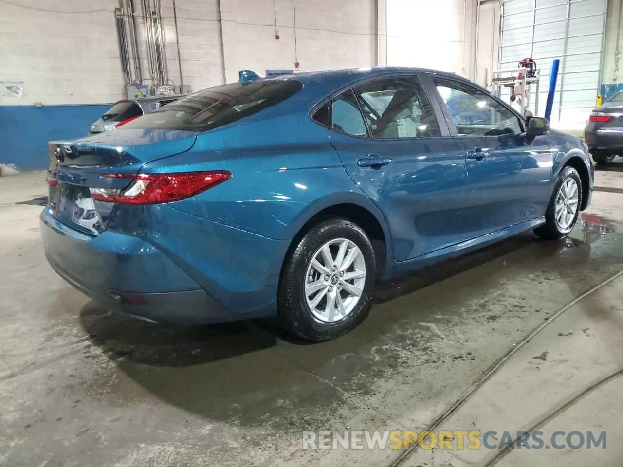 3 Photograph of a damaged car 4T1DBADK9SU522856 TOYOTA CAMRY 2025