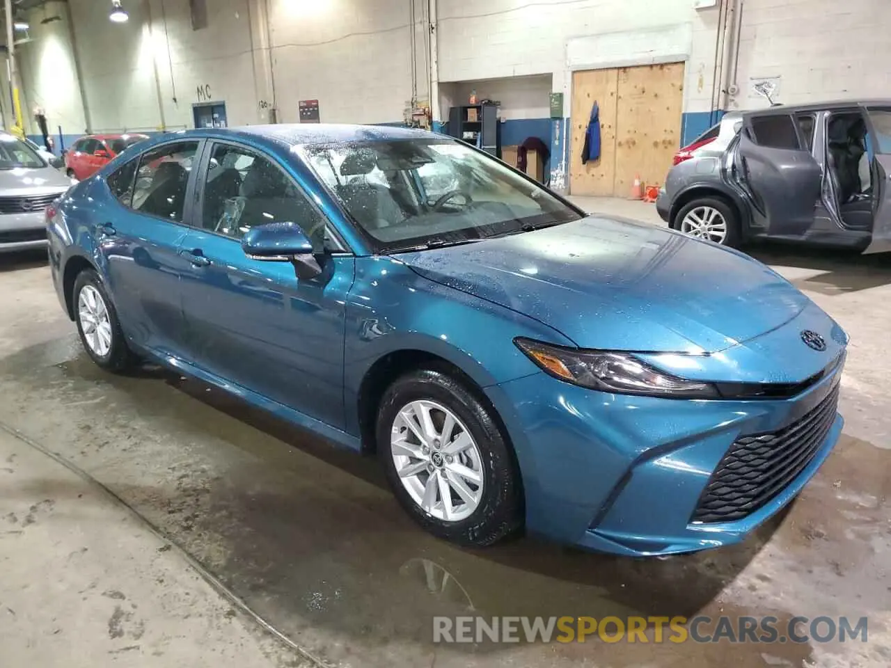 4 Photograph of a damaged car 4T1DBADK9SU522856 TOYOTA CAMRY 2025