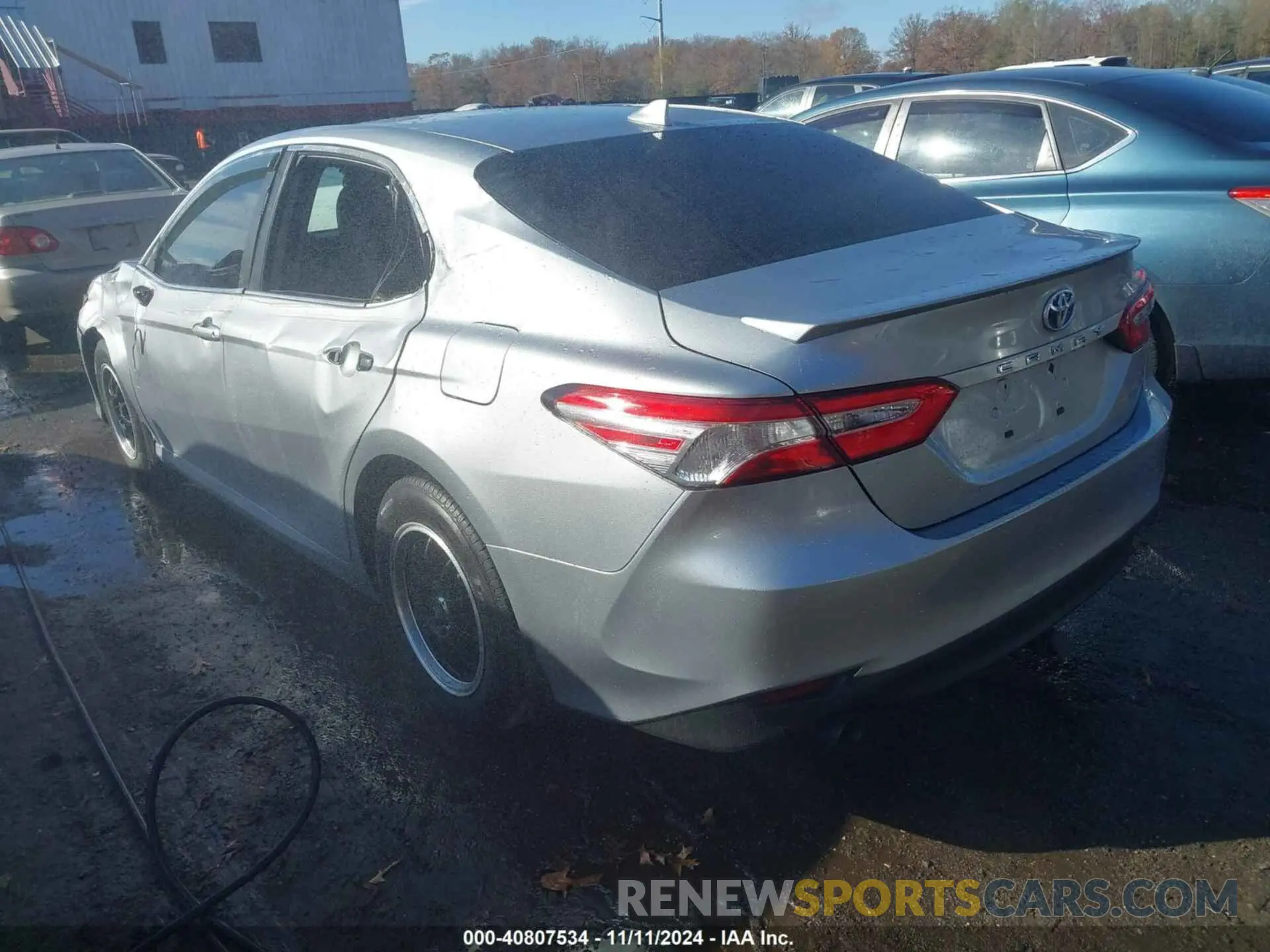 3 Photograph of a damaged car 4T1B31HK6KU516916 TOYOTA CAMRY HYBRID 2019