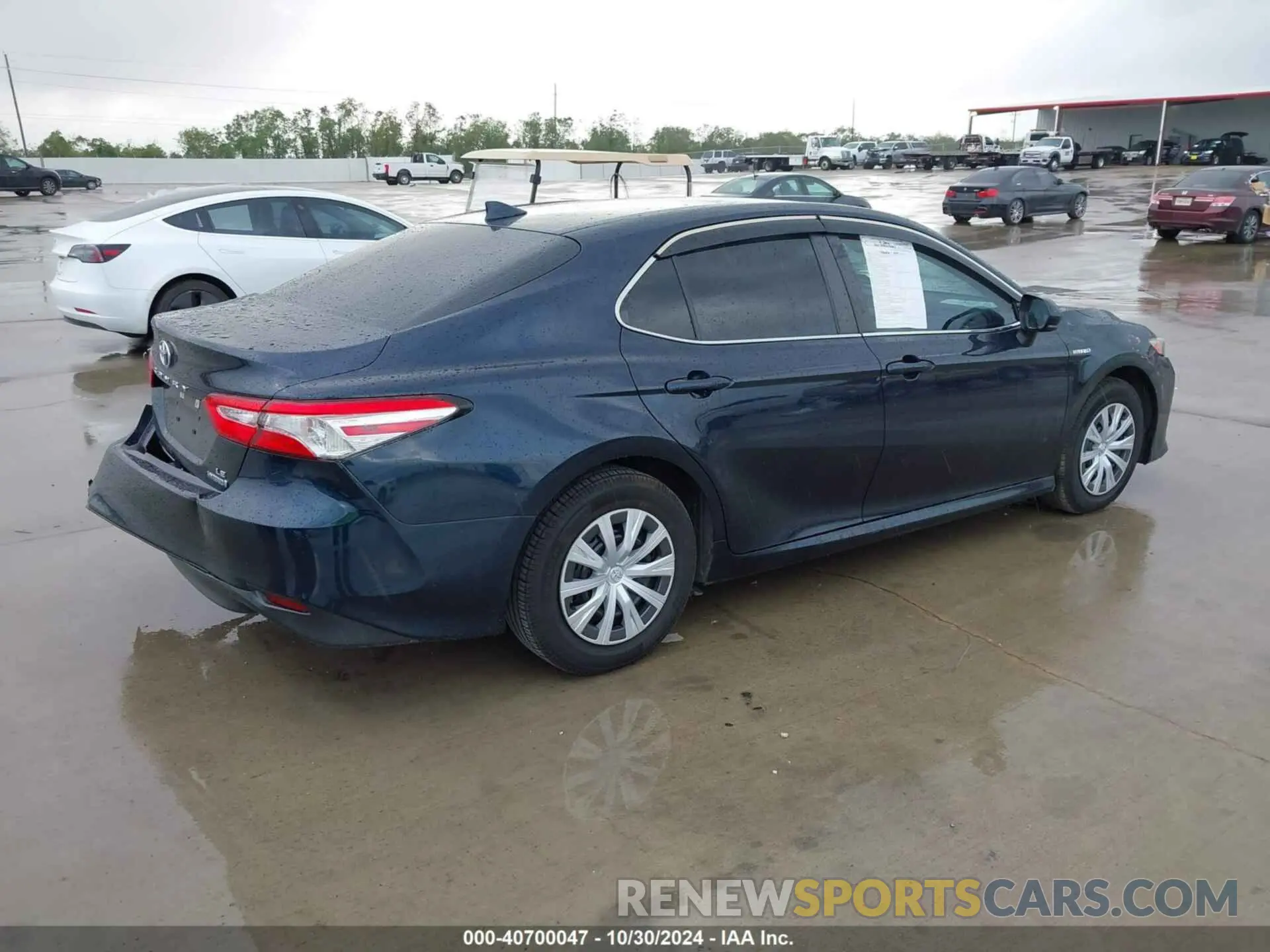 4 Photograph of a damaged car 4T1B31HK9KU517817 TOYOTA CAMRY HYBRID 2019