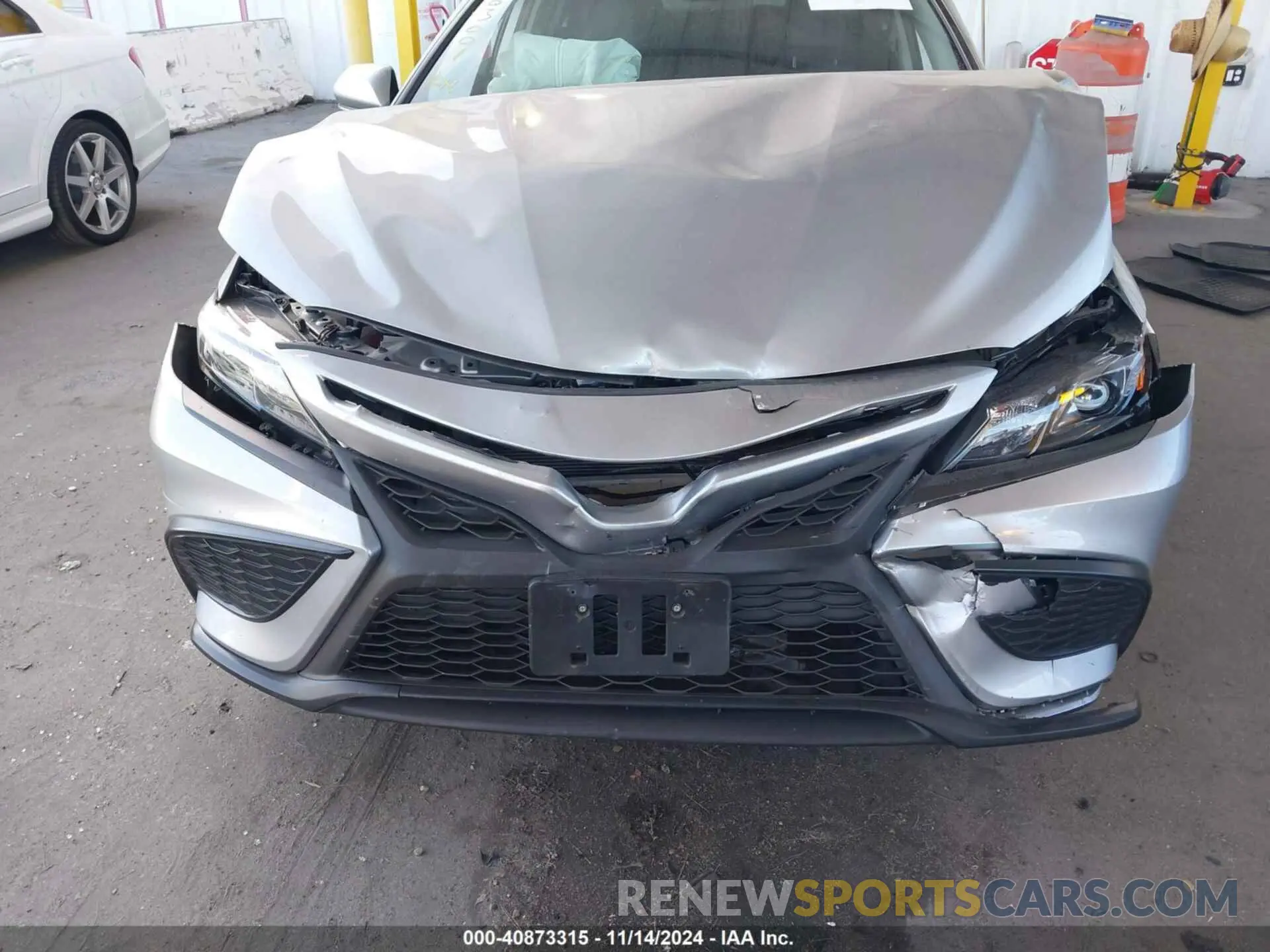 6 Photograph of a damaged car 4T1G31AK3RU074574 TOYOTA CAMRY HYBRID 2024