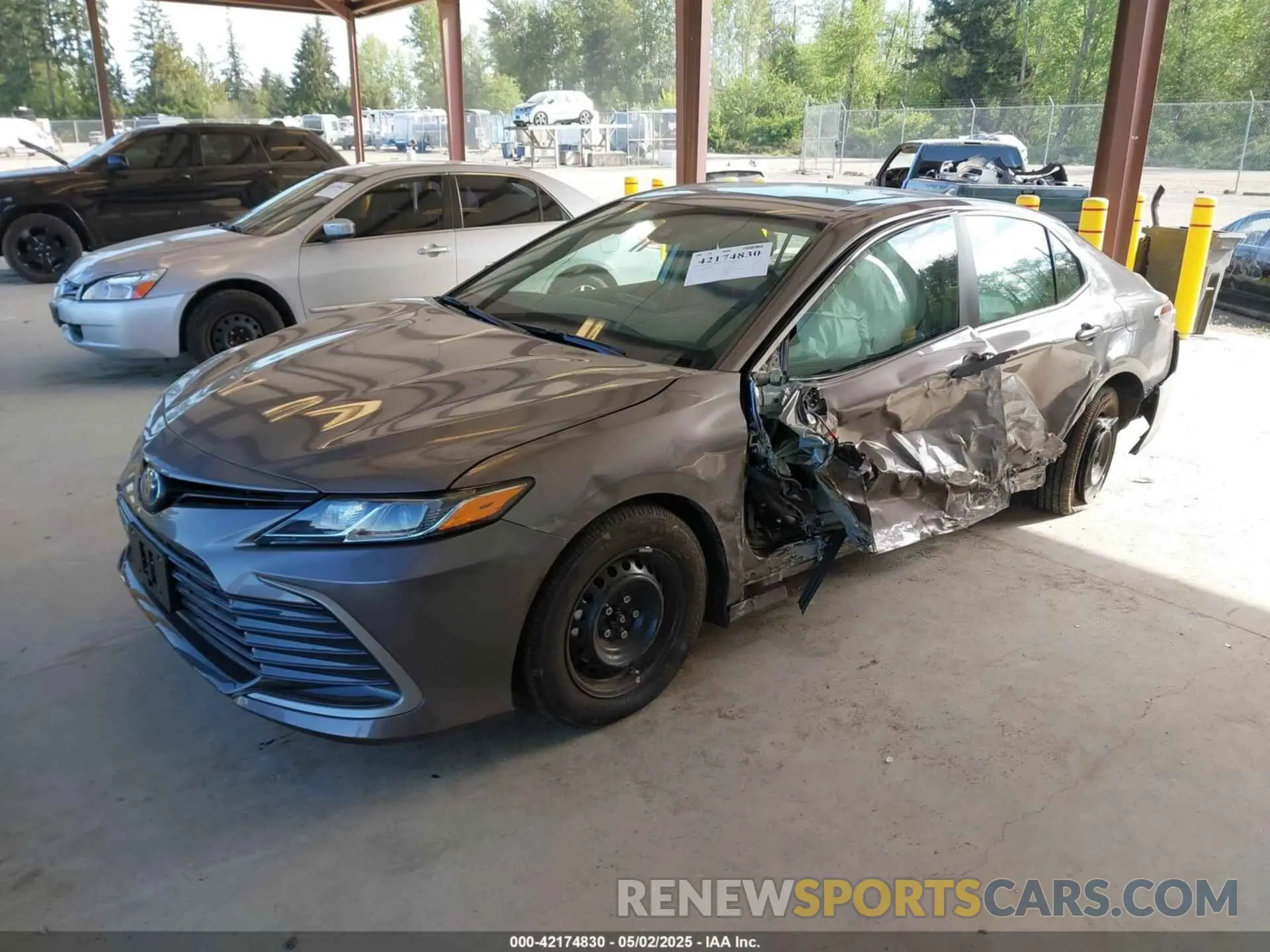 2 Photograph of a damaged car 4T1H31AK2RU077602 TOYOTA CAMRY HYBRID 2024