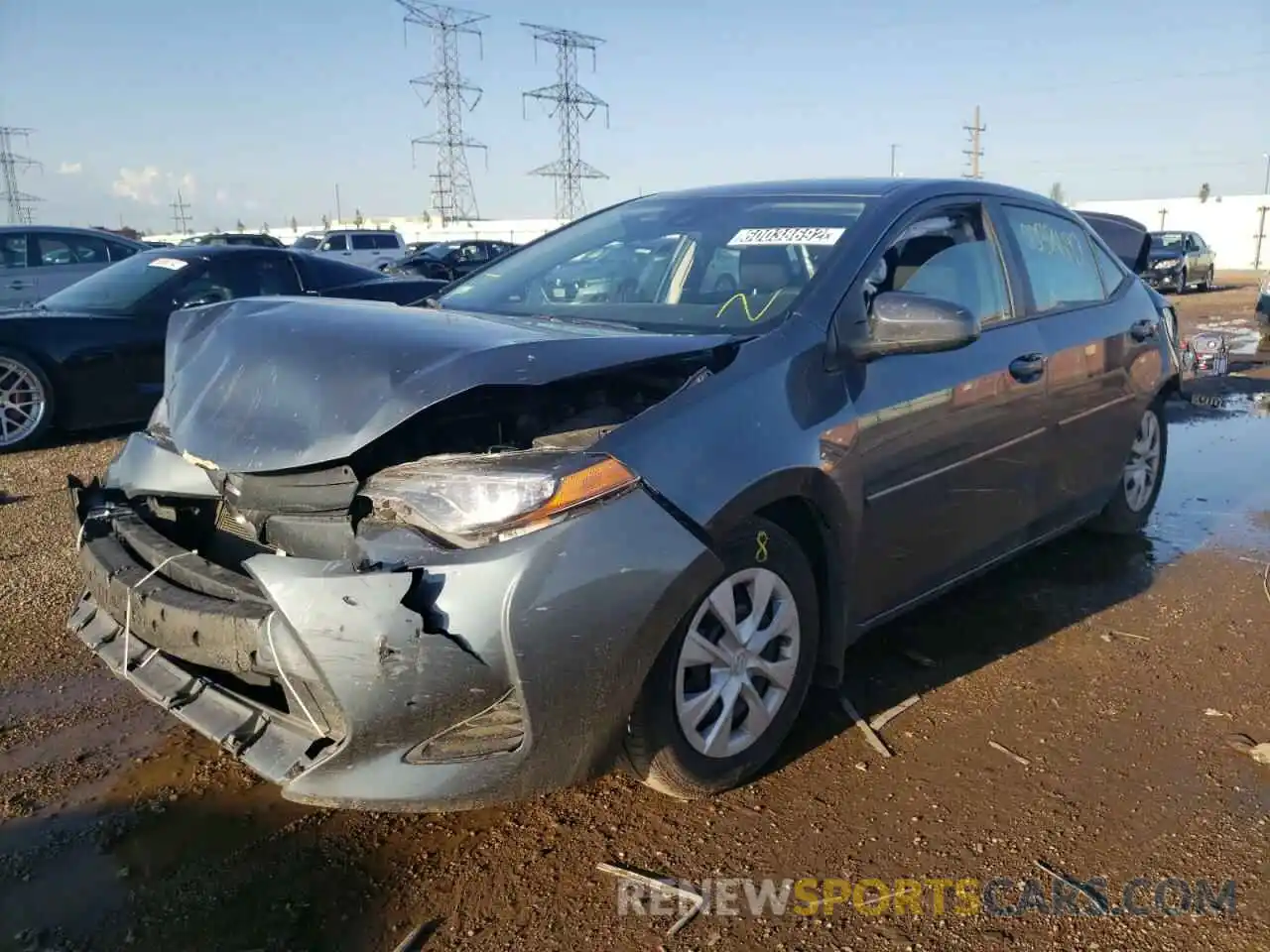 2 Photograph of a damaged car 2T1BPRHE2KC185590 TOYOTA COROLLA 2019