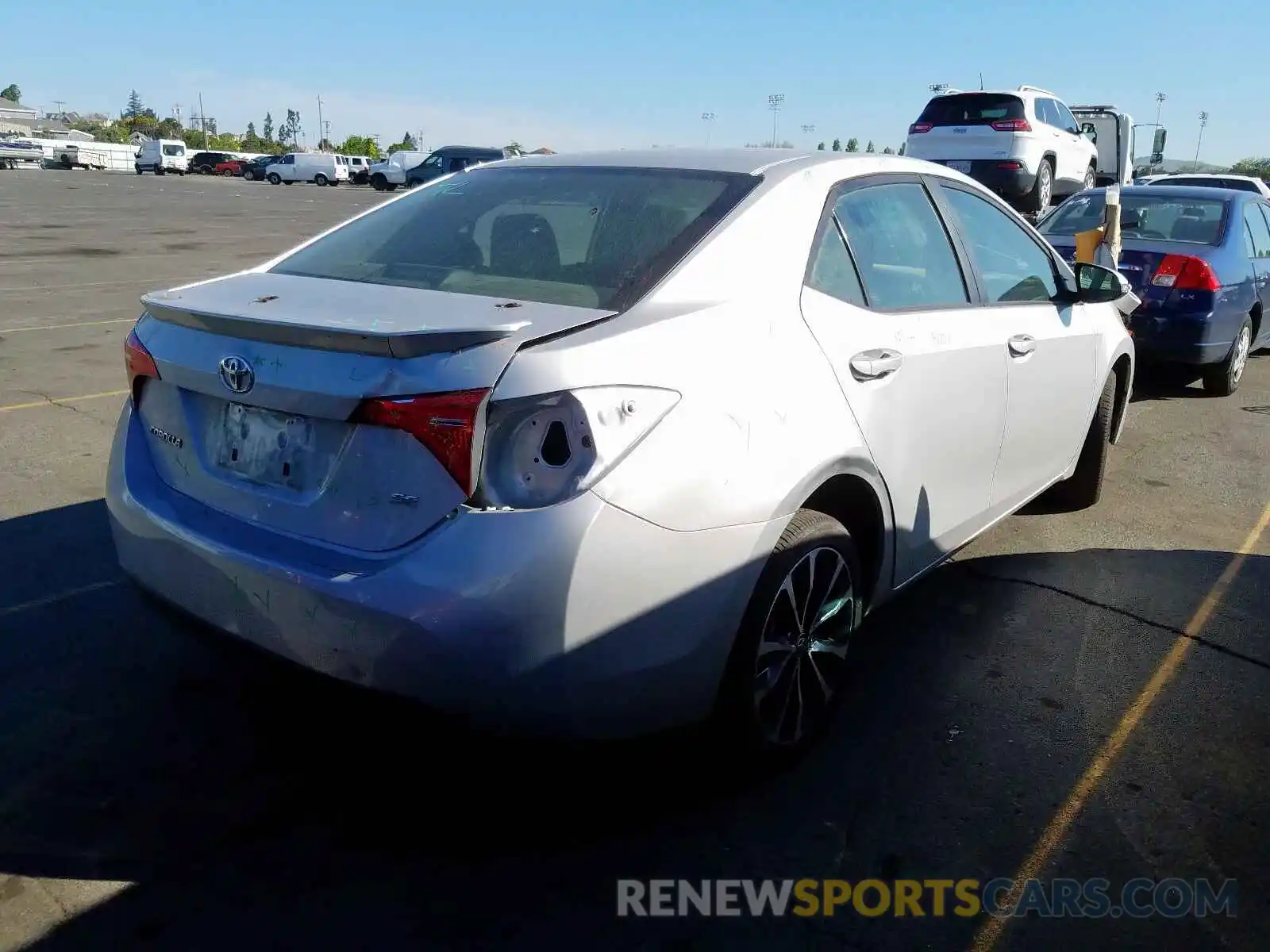 4 Photograph of a damaged car 2T1BURHE1KC211556 TOYOTA COROLLA 2019