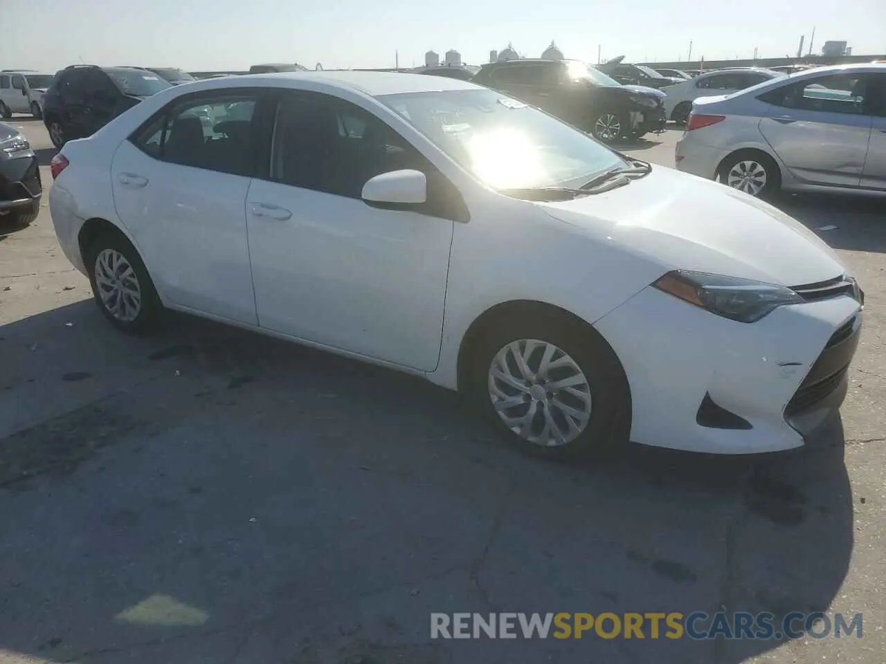 4 Photograph of a damaged car 2T1BURHE9KC242330 TOYOTA COROLLA 2019