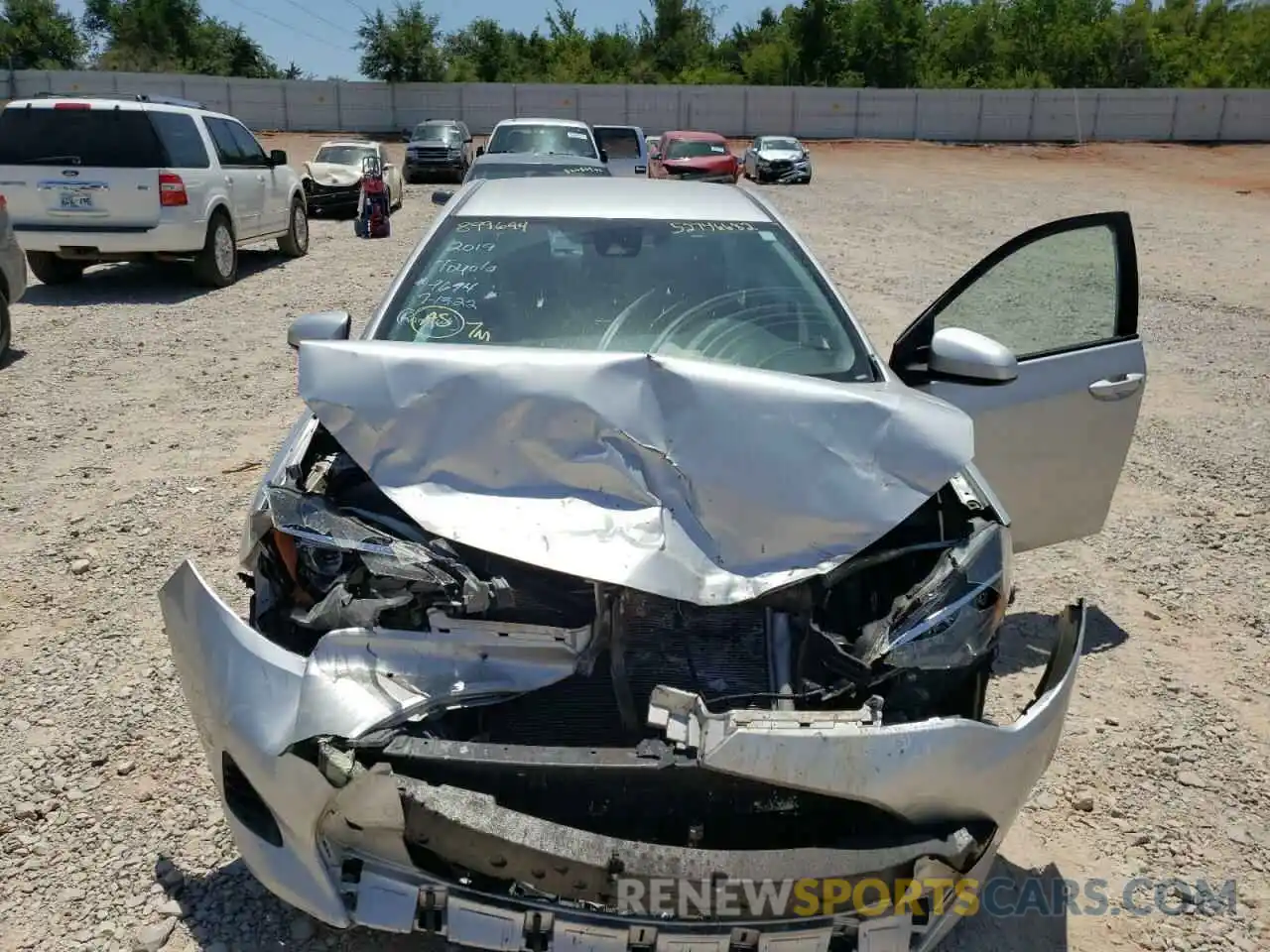 7 Photograph of a damaged car 5YFBURHE0KP899694 TOYOTA COROLLA 2019