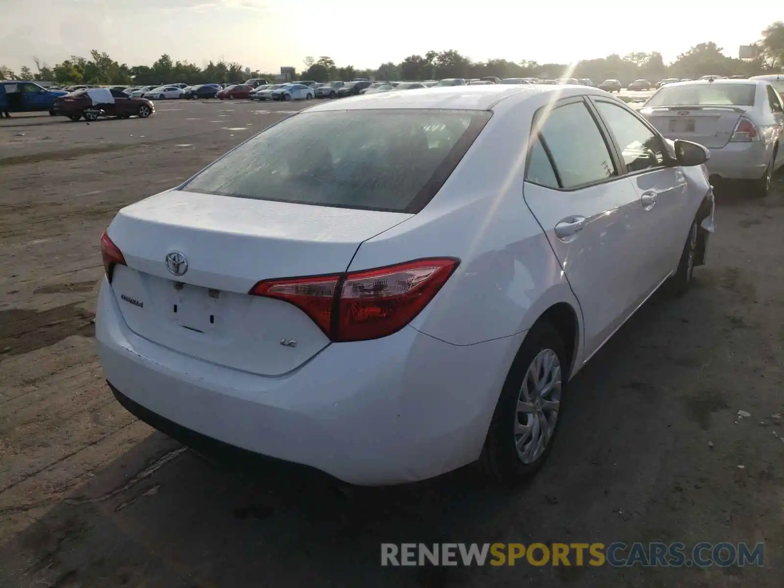 4 Photograph of a damaged car 5YFBURHE0KP937537 TOYOTA COROLLA 2019