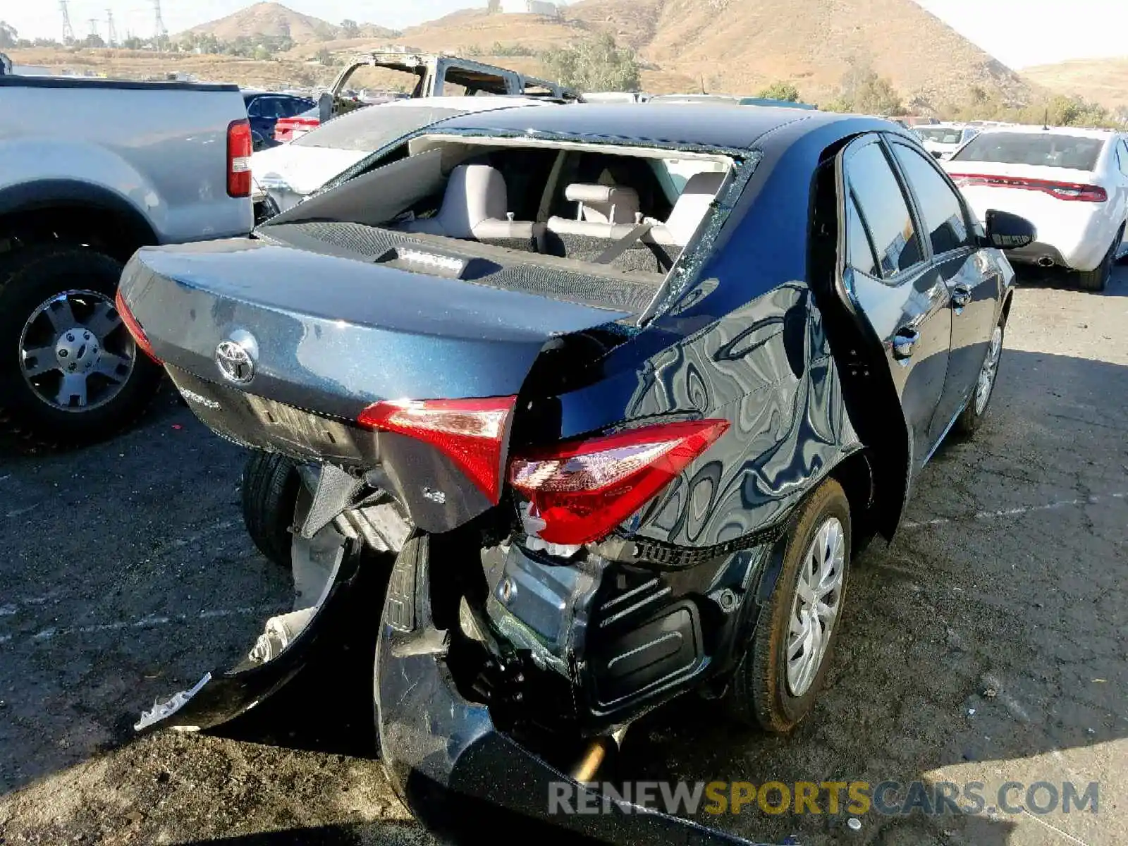 4 Photograph of a damaged car 5YFBURHE0KP949185 TOYOTA COROLLA 2019