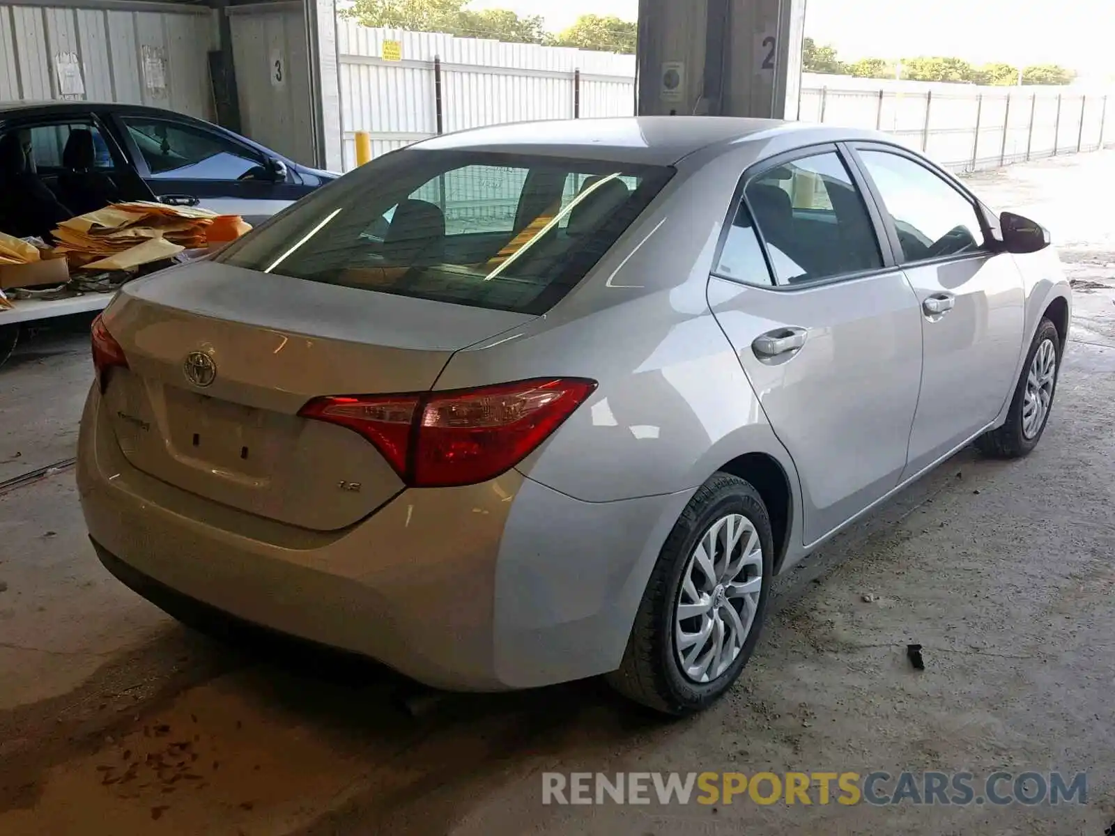 4 Photograph of a damaged car 5YFBURHE1KP899543 TOYOTA COROLLA 2019