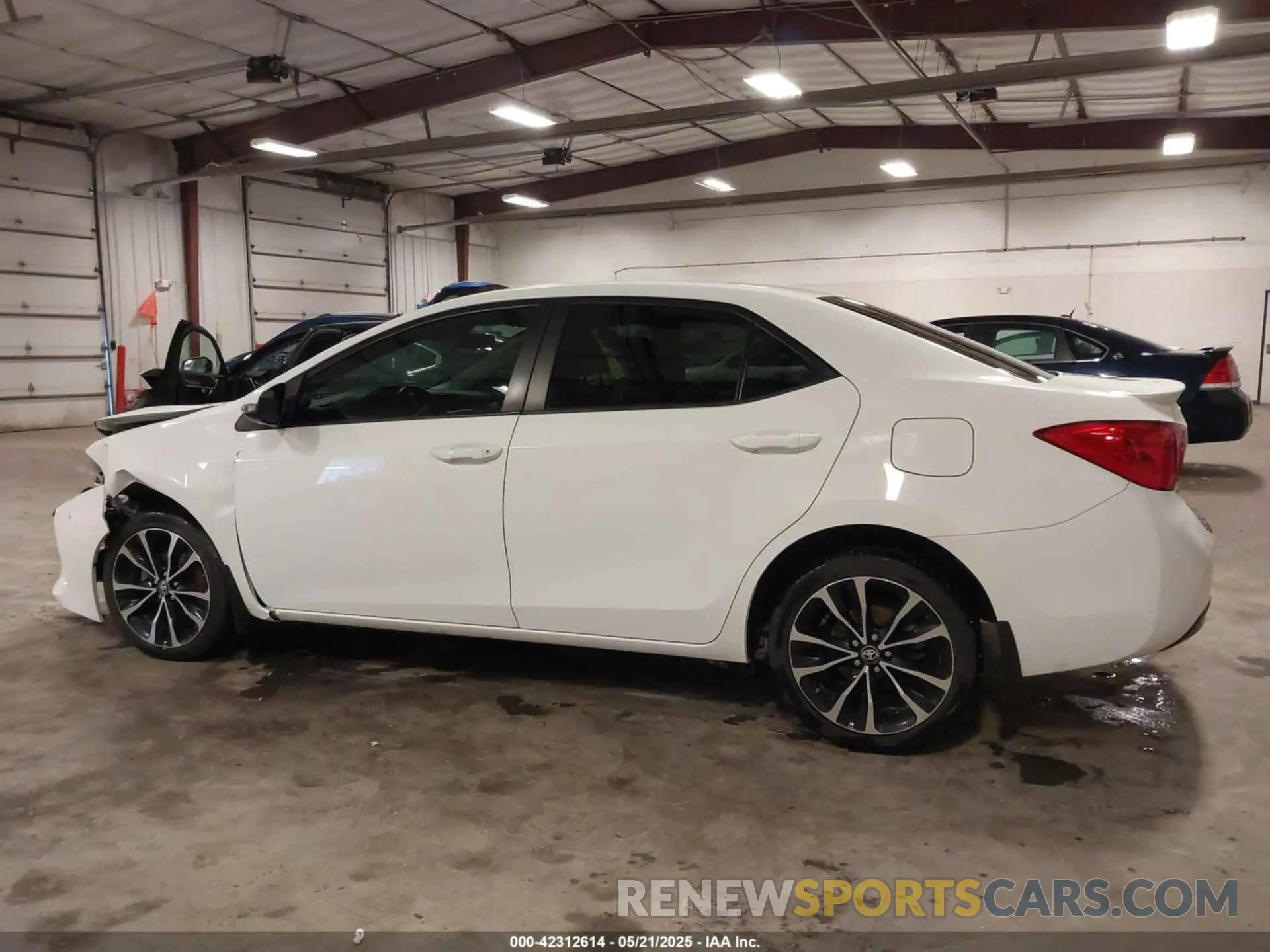 14 Photograph of a damaged car 5YFBURHE2KP903812 TOYOTA COROLLA 2019