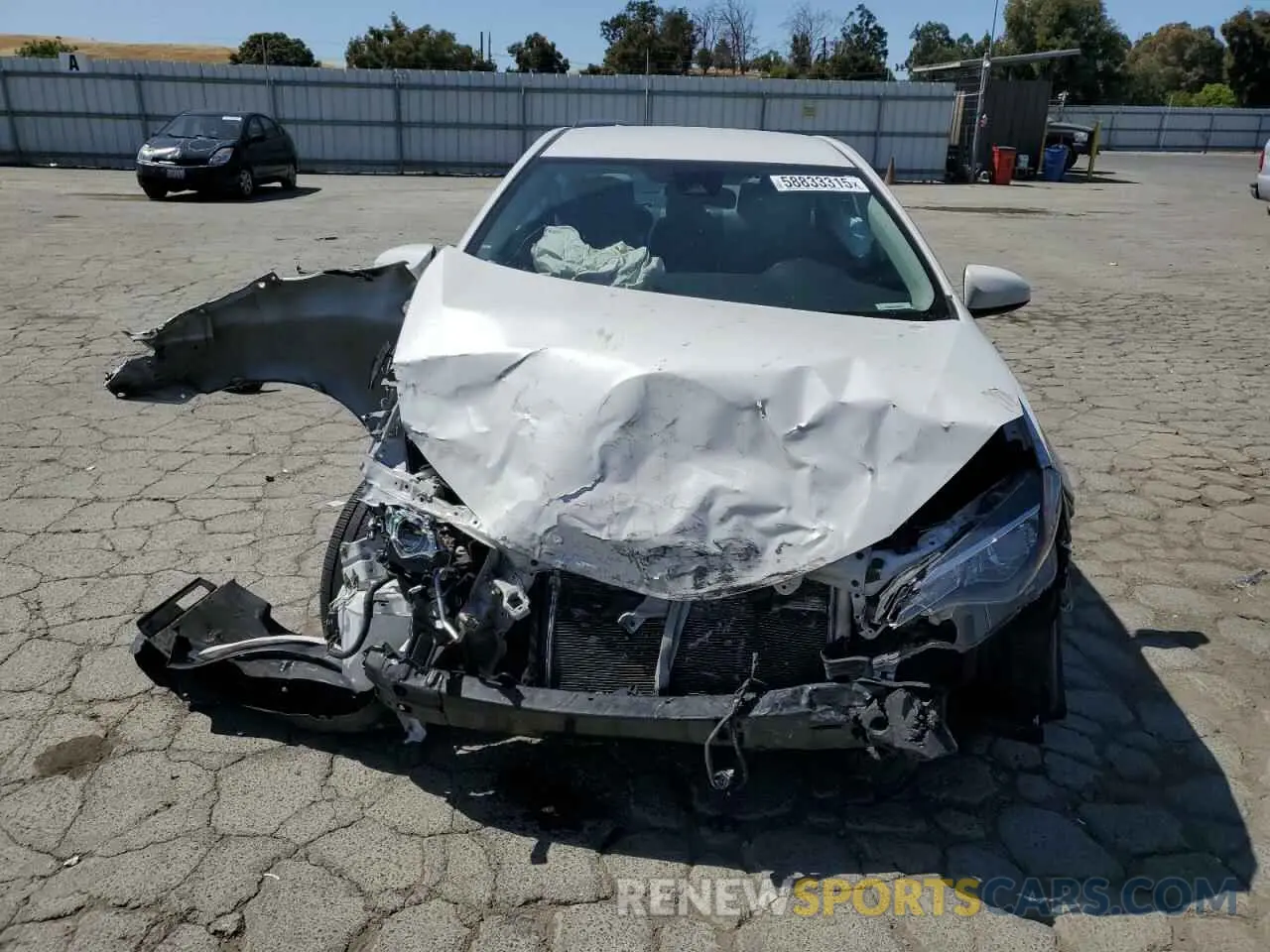 5 Photograph of a damaged car 5YFBURHE3KP856564 TOYOTA COROLLA 2019
