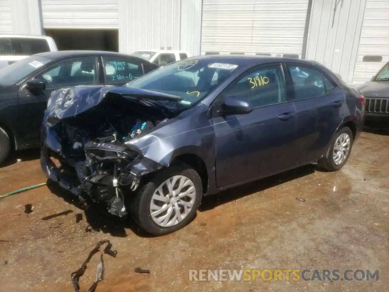 2 Photograph of a damaged car 5YFBURHE3KP869220 TOYOTA COROLLA 2019