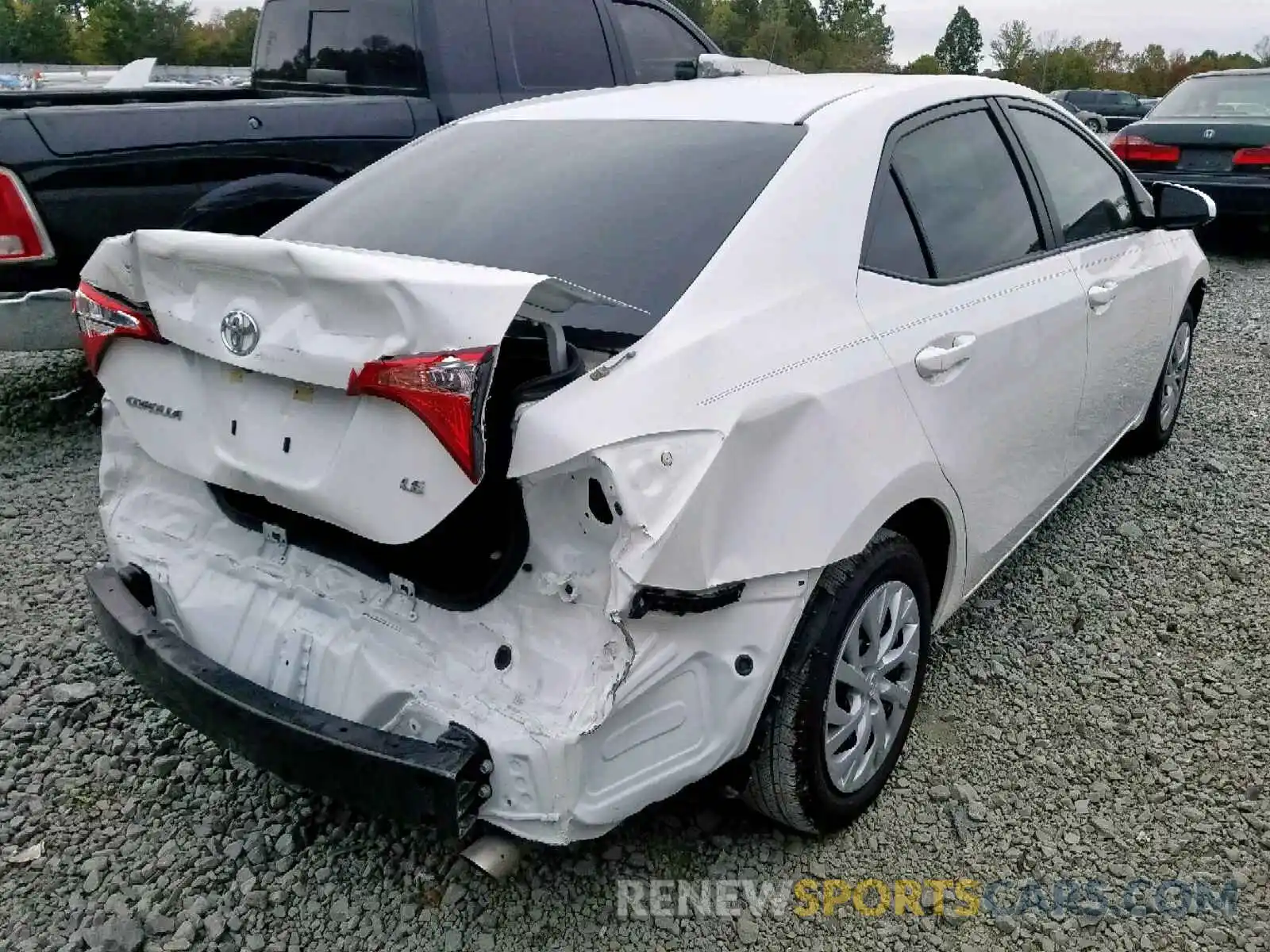 4 Photograph of a damaged car 5YFBURHE3KP879388 TOYOTA COROLLA 2019