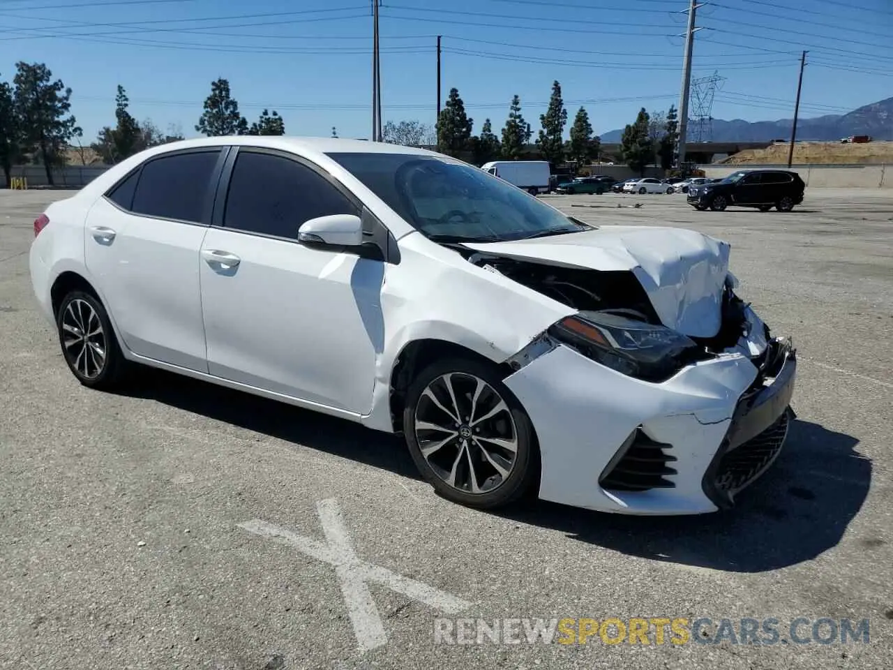4 Photograph of a damaged car 5YFBURHE3KP940190 TOYOTA COROLLA 2019