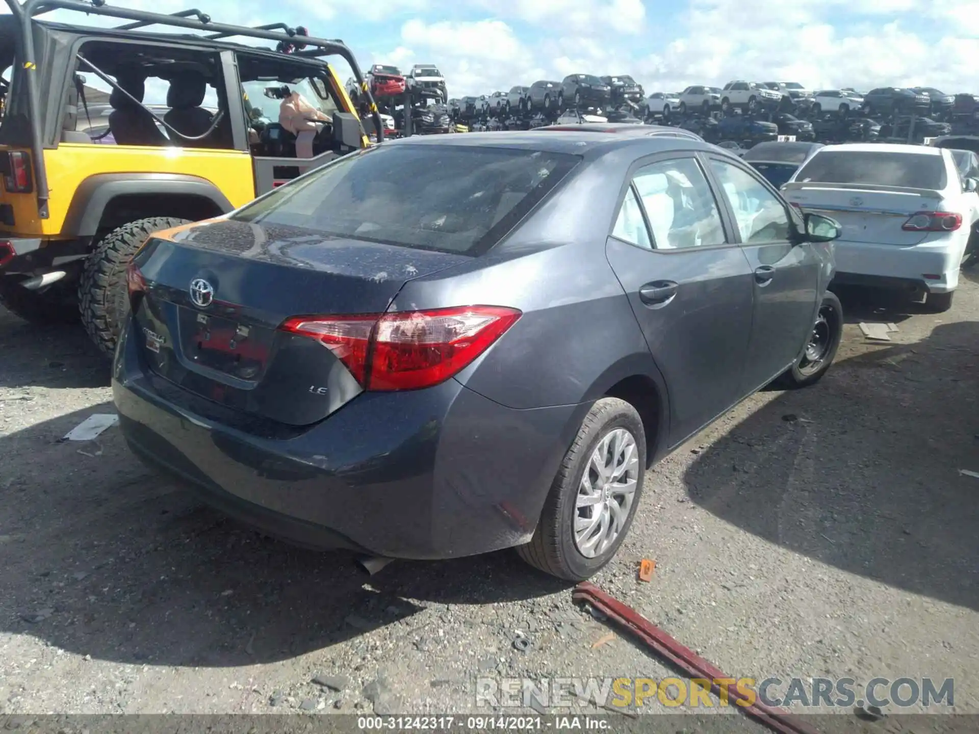 4 Photograph of a damaged car 5YFBURHE4KP870098 TOYOTA COROLLA 2019