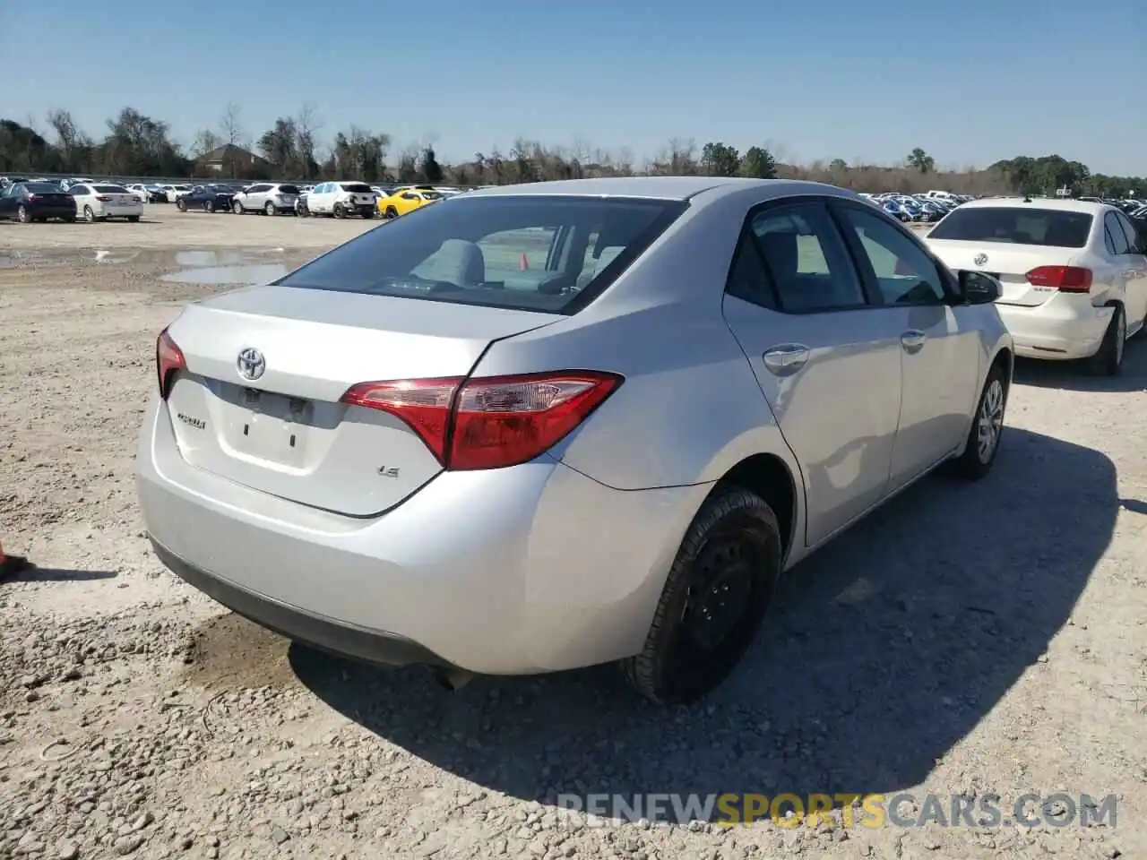 4 Photograph of a damaged car 5YFBURHE4KP873180 TOYOTA COROLLA 2019