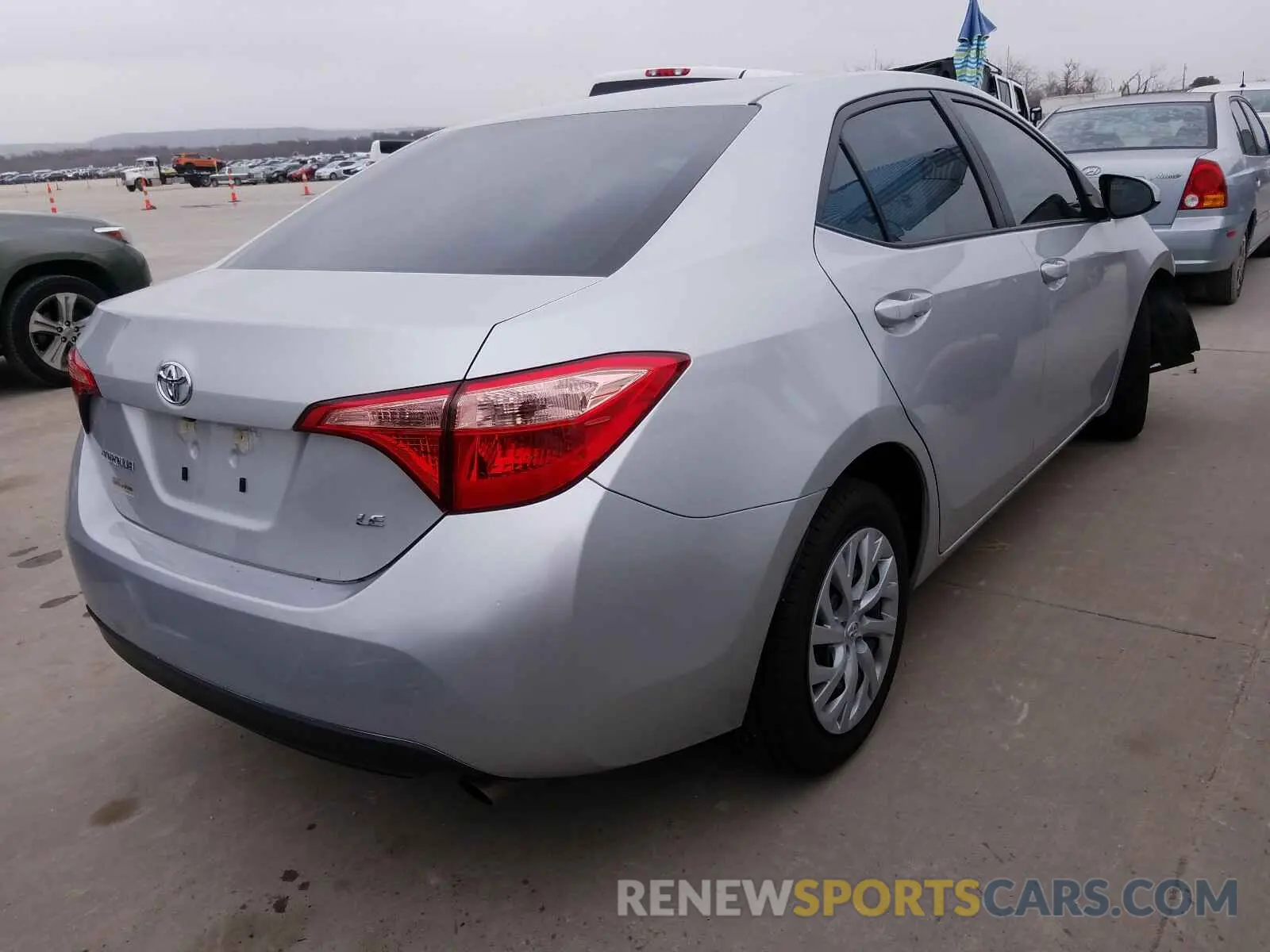 4 Photograph of a damaged car 5YFBURHE4KP921762 TOYOTA COROLLA 2019