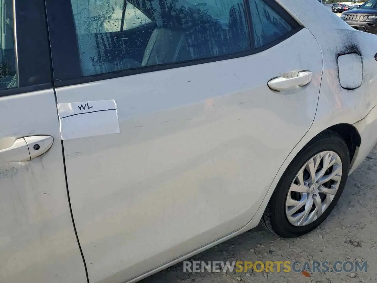 12 Photograph of a damaged car 5YFBURHE5KP869185 TOYOTA COROLLA 2019